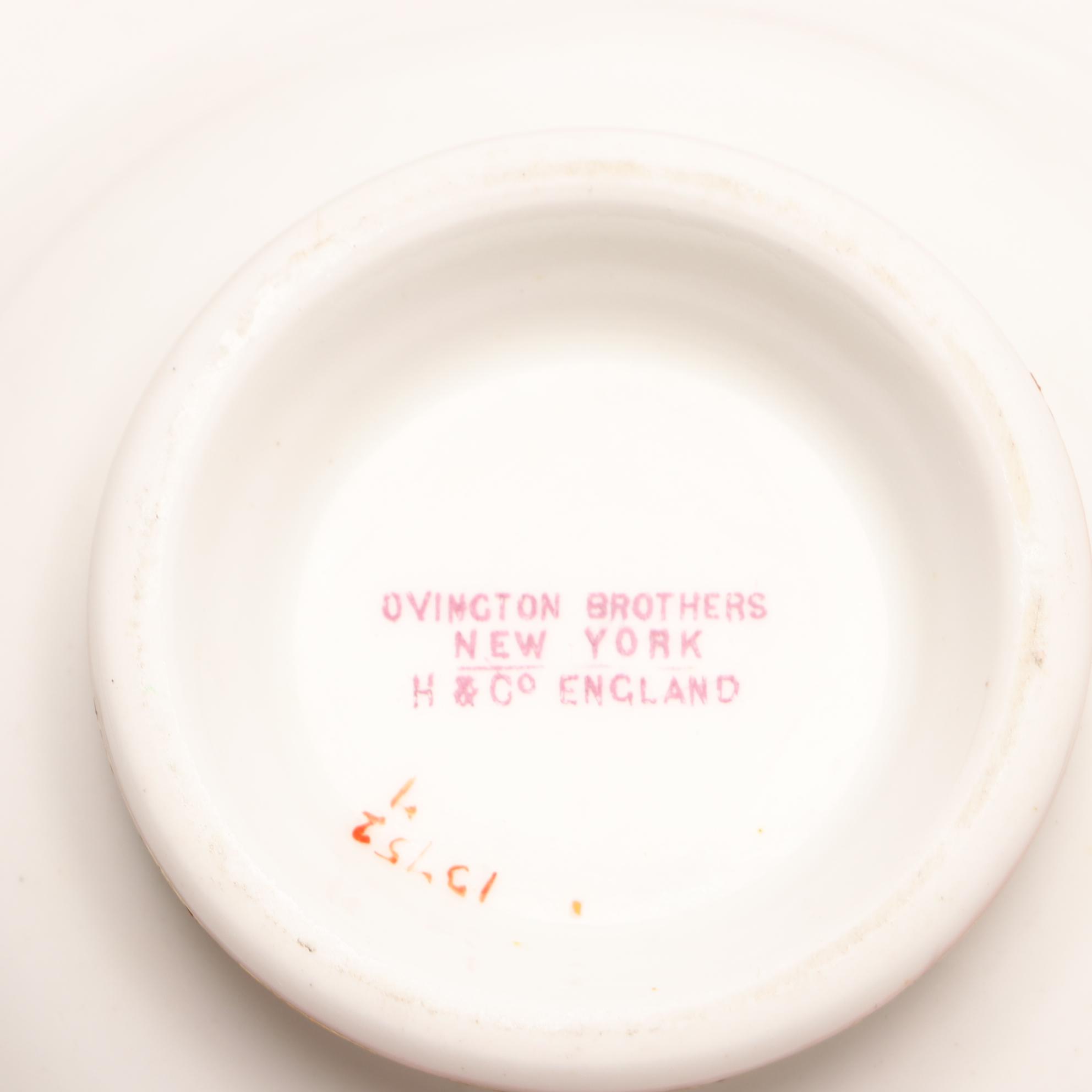 Assorted Gold and White Dinnerware Featuring Limoges and Royal Worcester