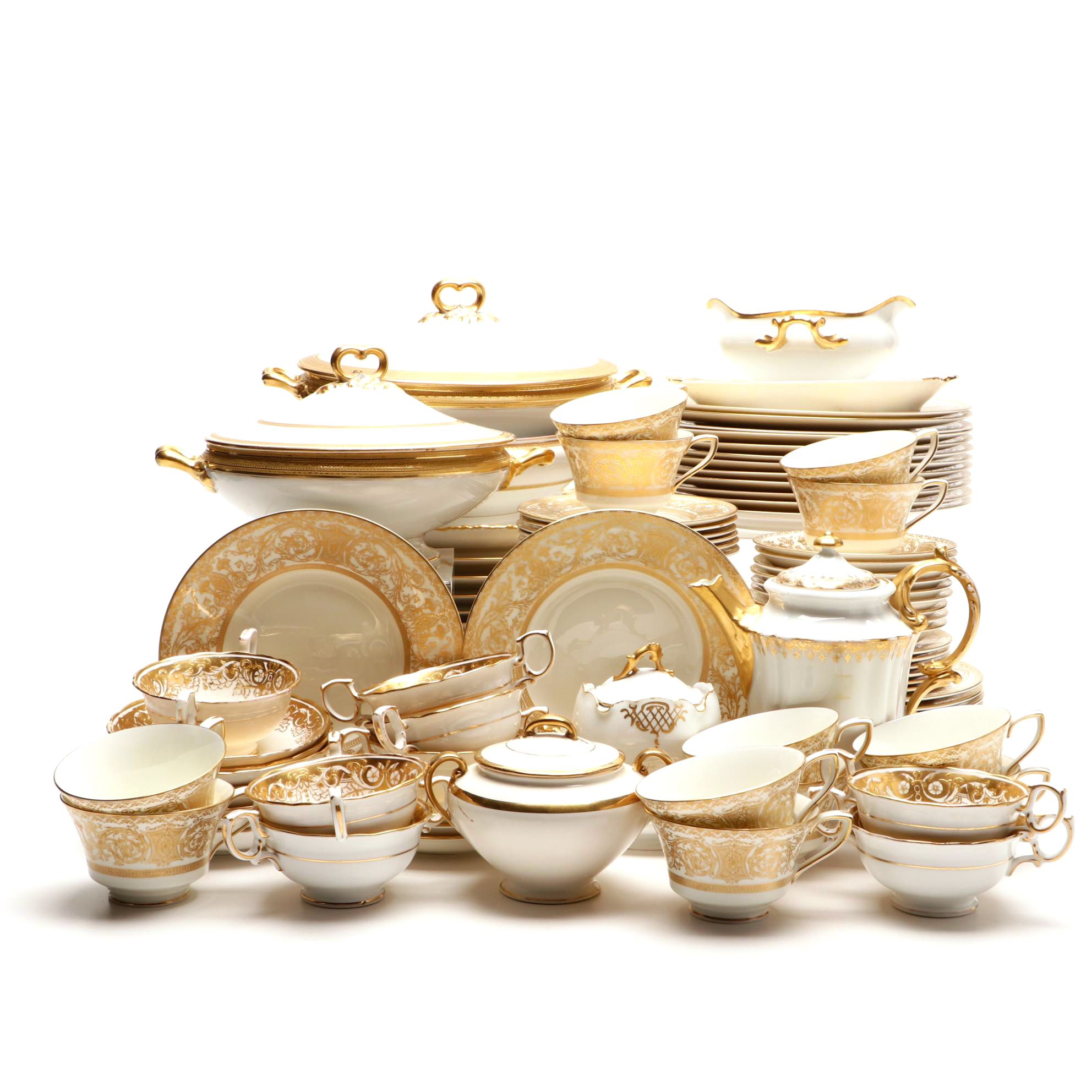 Assorted Gold and White Dinnerware Featuring Limoges and Royal Worcester