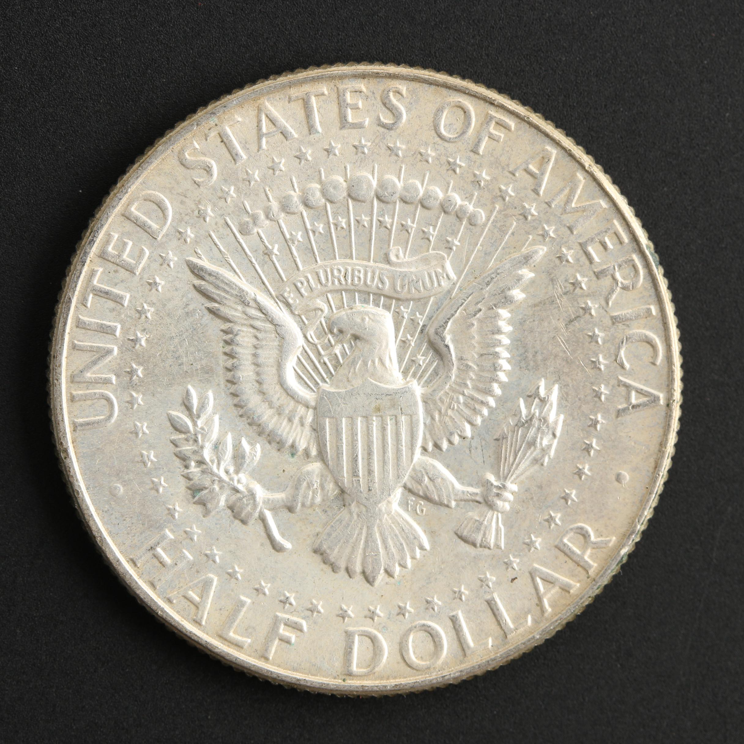 Group of Twenty-Five Kennedy Silver Clad Half Dollars