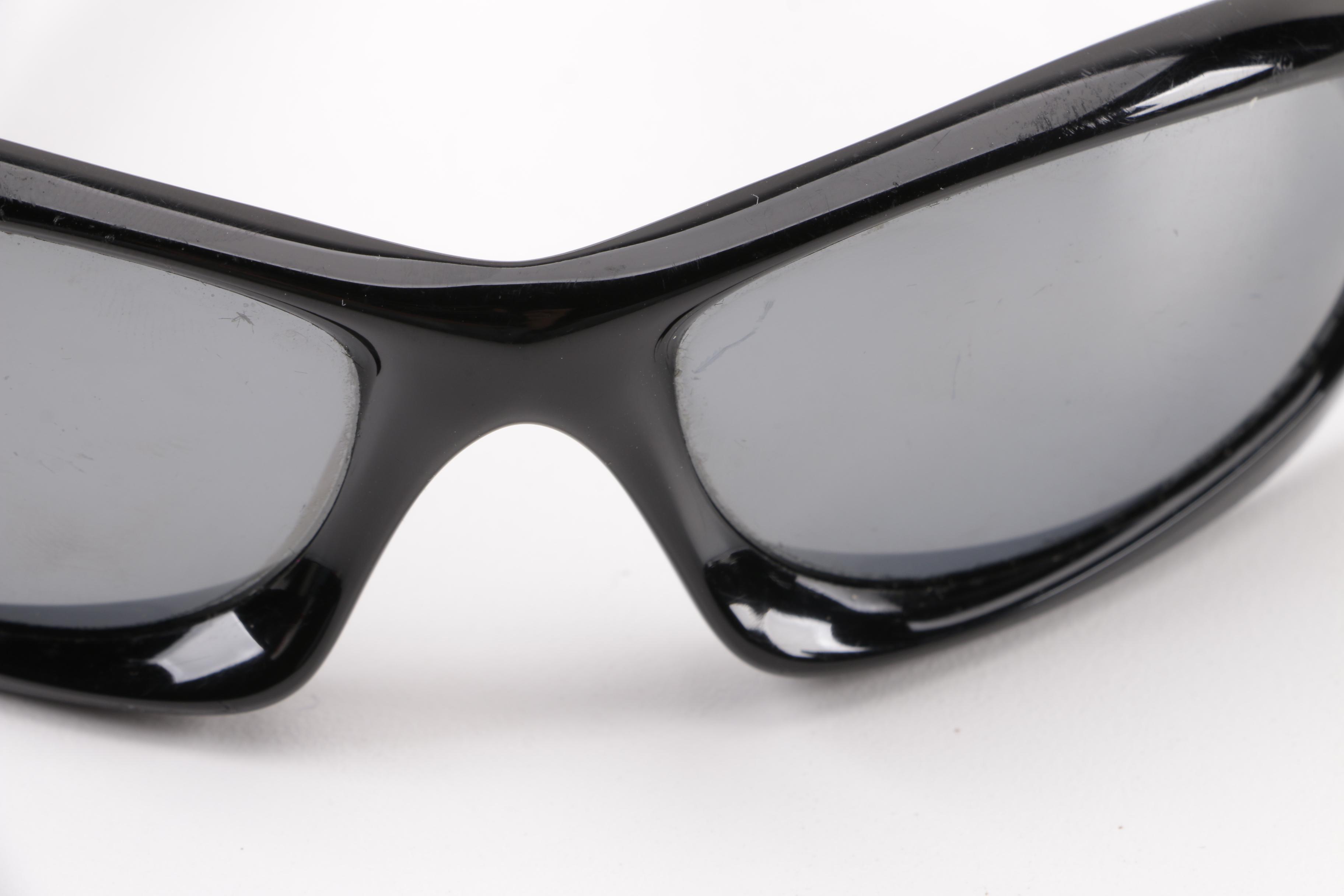 Oakley Polarized and Arnette Darelict Black Framed Wrap Sunglasses