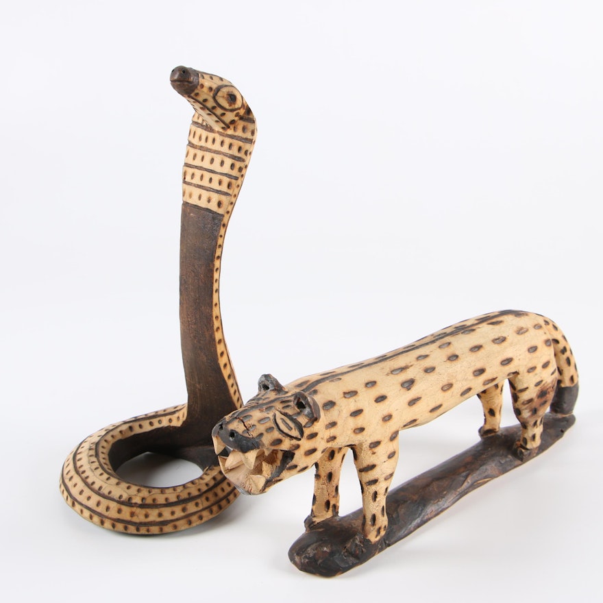 Hand-Carved Feline and Snake Sculptures