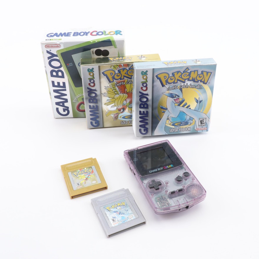 Nintendo Game Boy Color with "Pokémon Gold" and "Pokémon Silver"