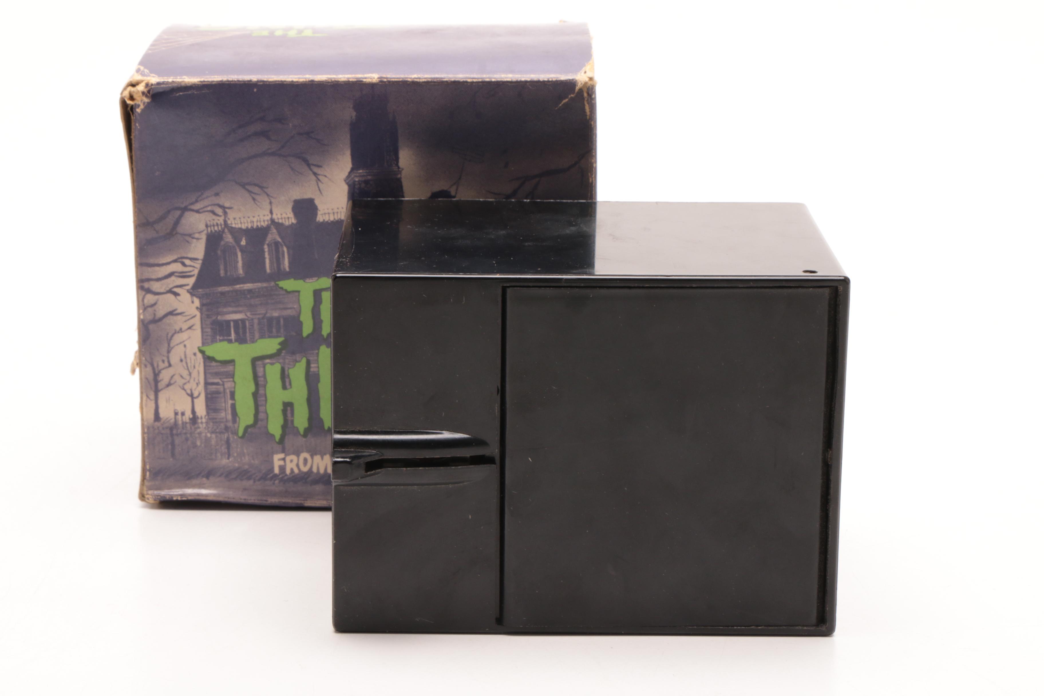 Thing Bank from the "Adams Family"