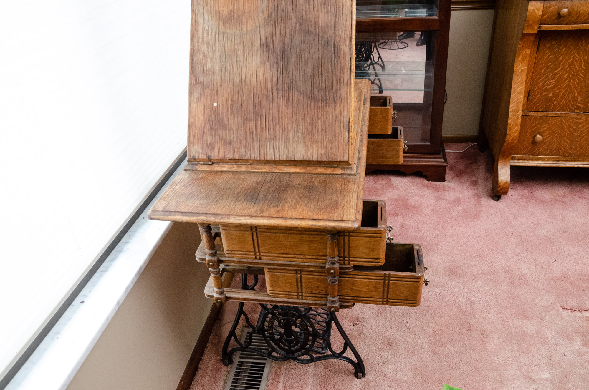 Antique Singer Sewing Machine in Oak Storage Cabinet