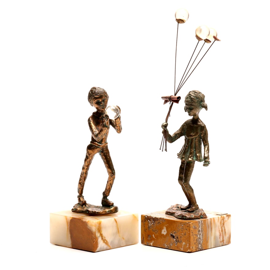 Bijan Bronze and Onyx Boy and Girl Sculptures