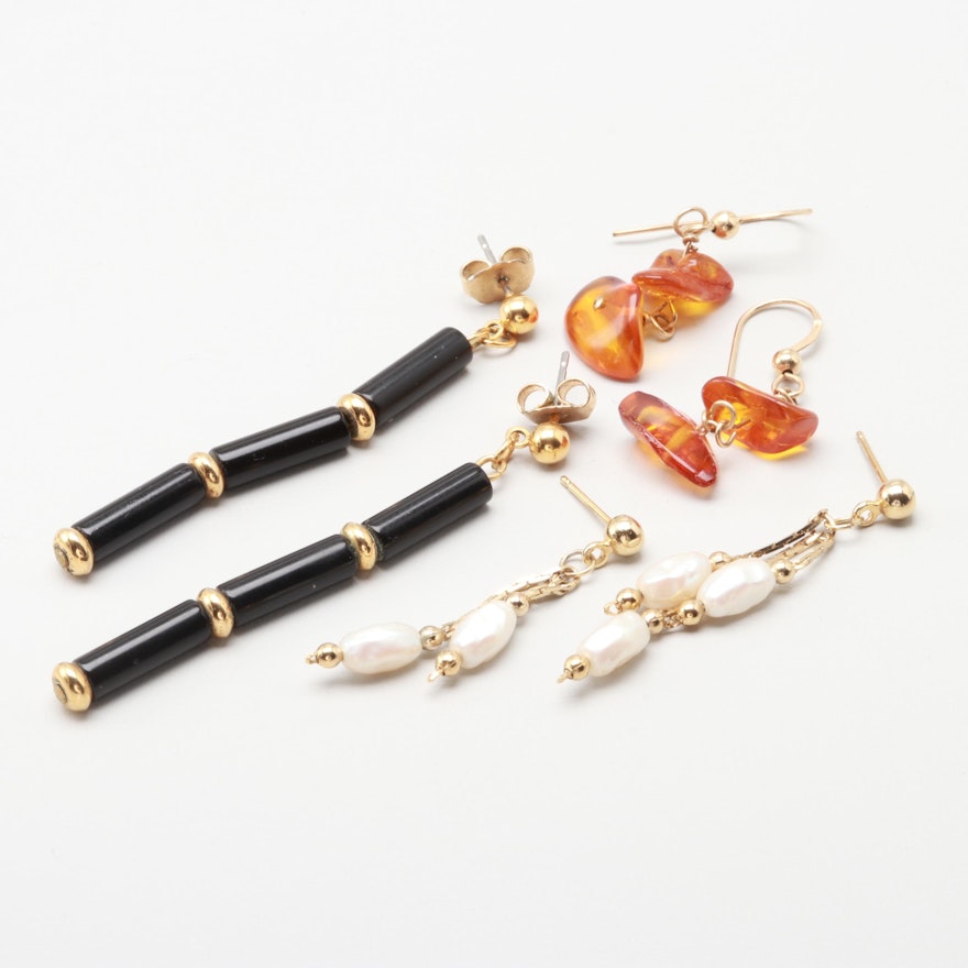 Selection of Gold Tone Earrings Including Cultured Pearls, Amber and Plastic