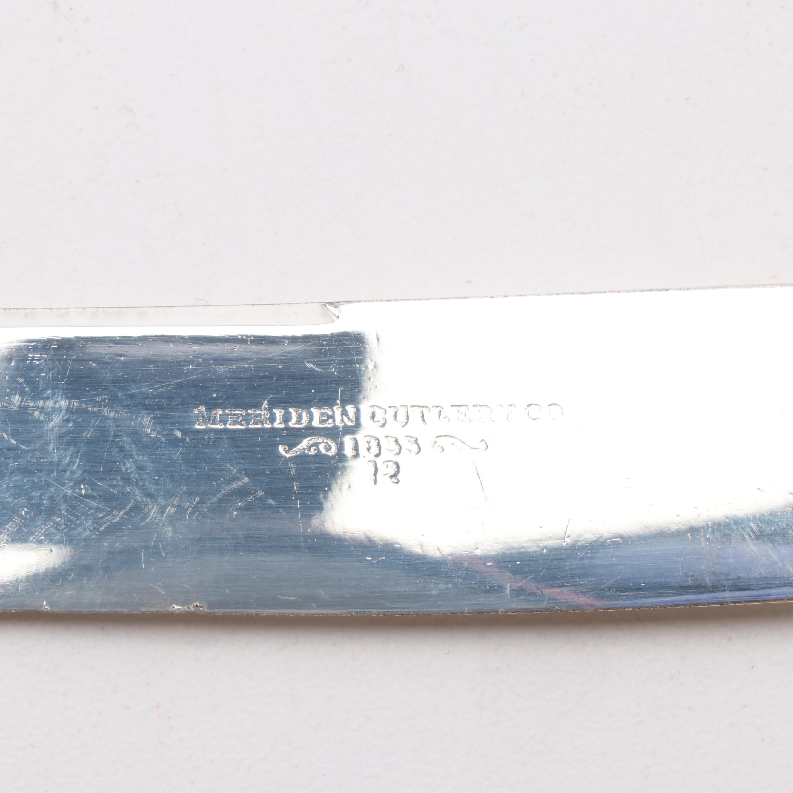 Mother of Pearl and Silver Plate Dinner Knives featuring Landers, Frary & Clark