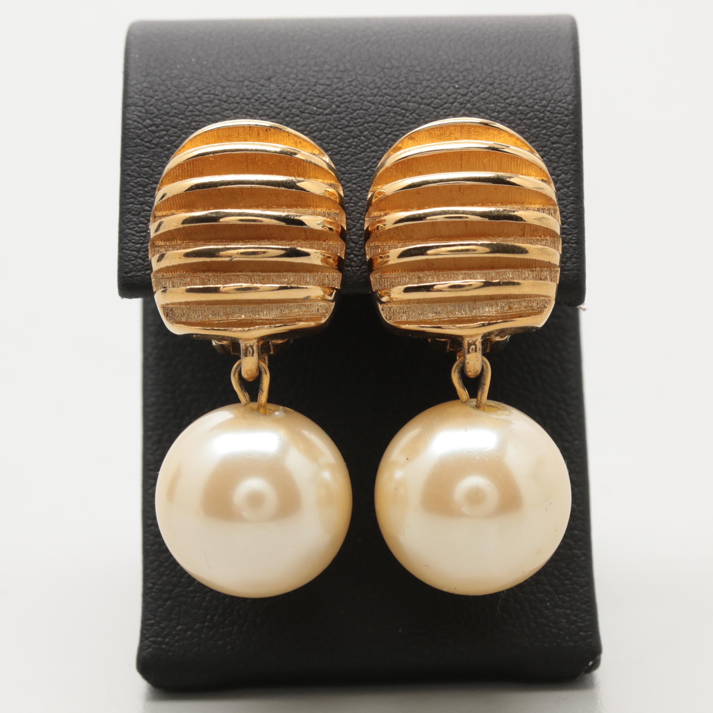 Pair of 1980s Givenchy Gold Tone Logo Statement Earrings