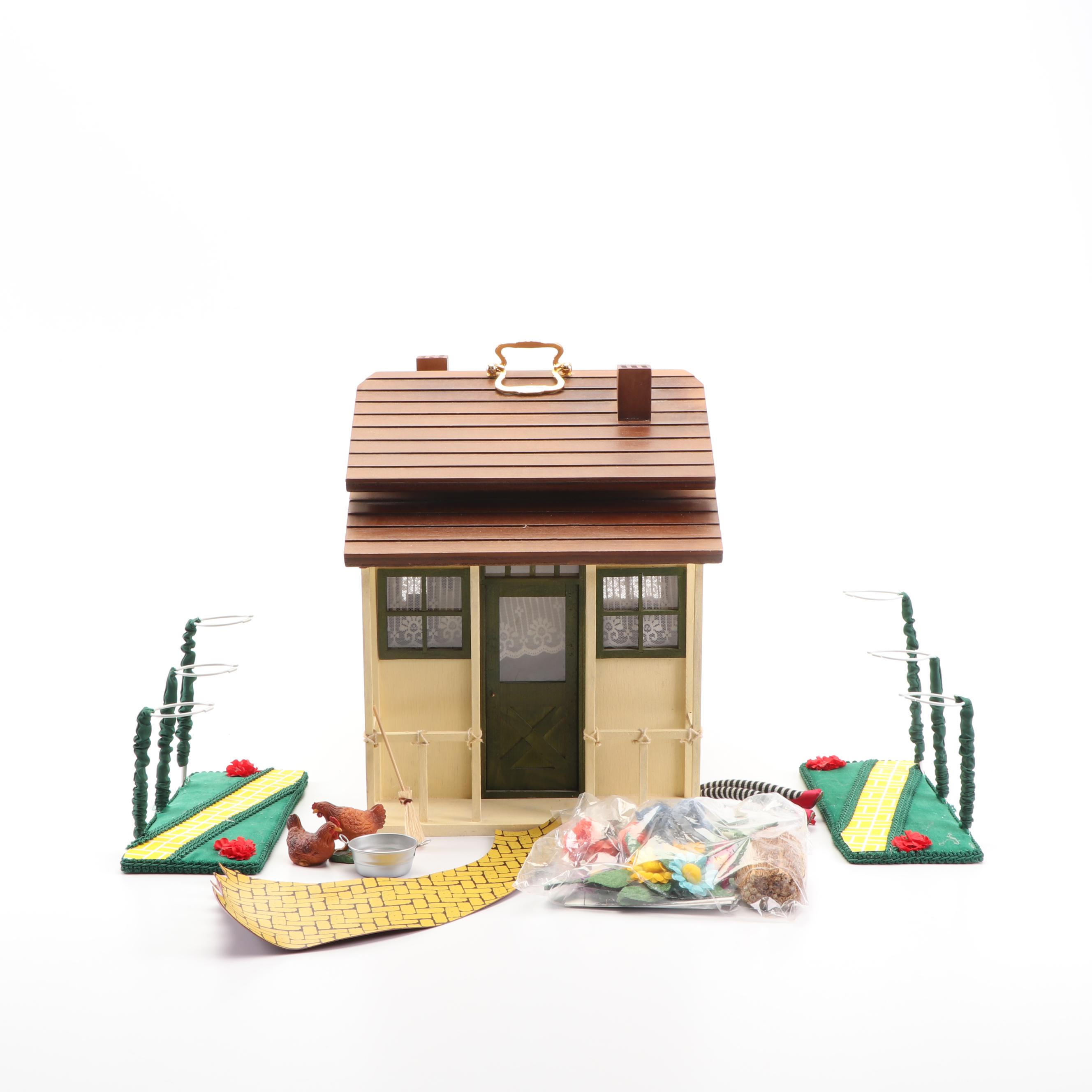 Madame Alexander "Wizard of Oz" Dollhouse and Ann Rast "Yellow Brick Road" Stand