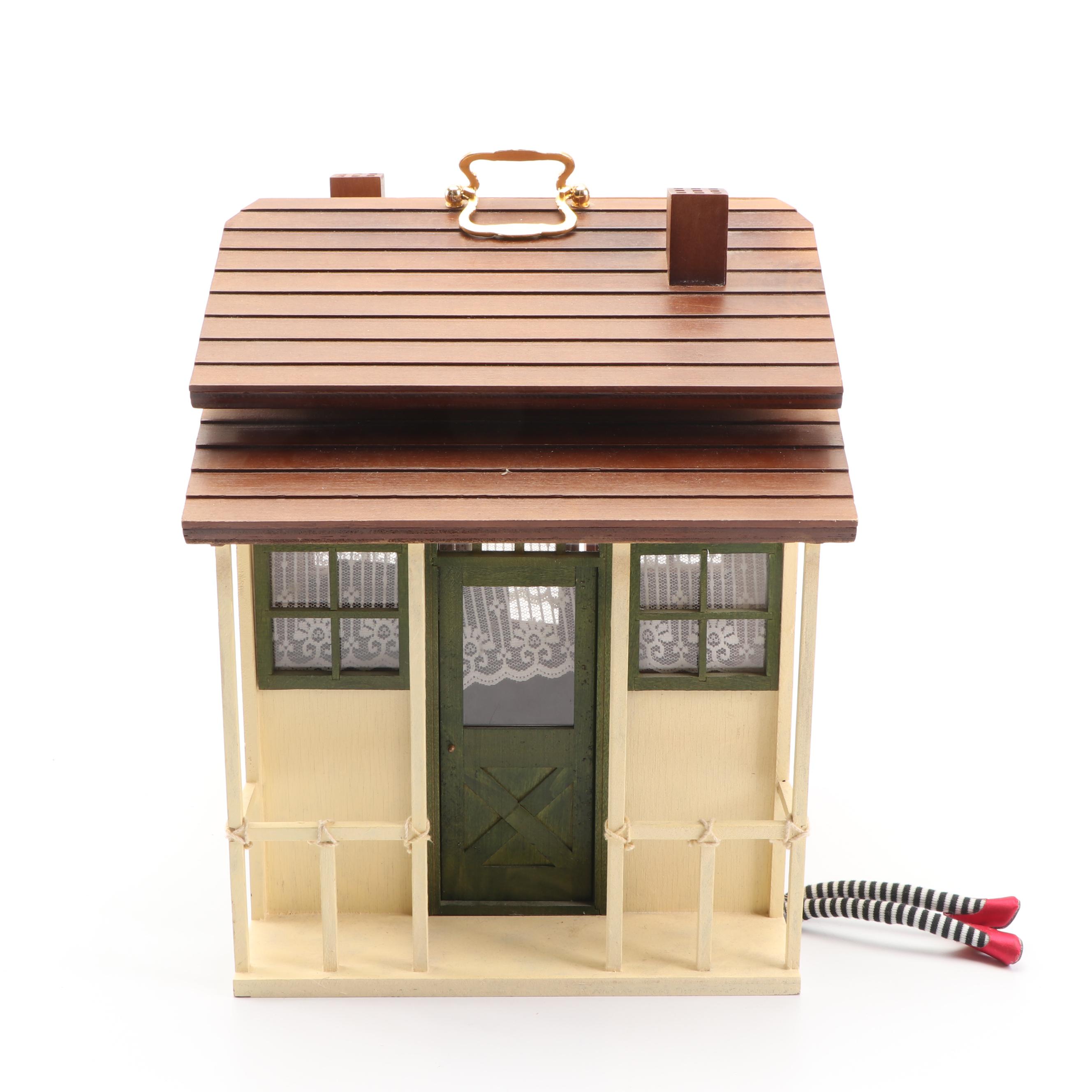 Madame Alexander "Wizard of Oz" Dollhouse and Ann Rast "Yellow Brick Road" Stand