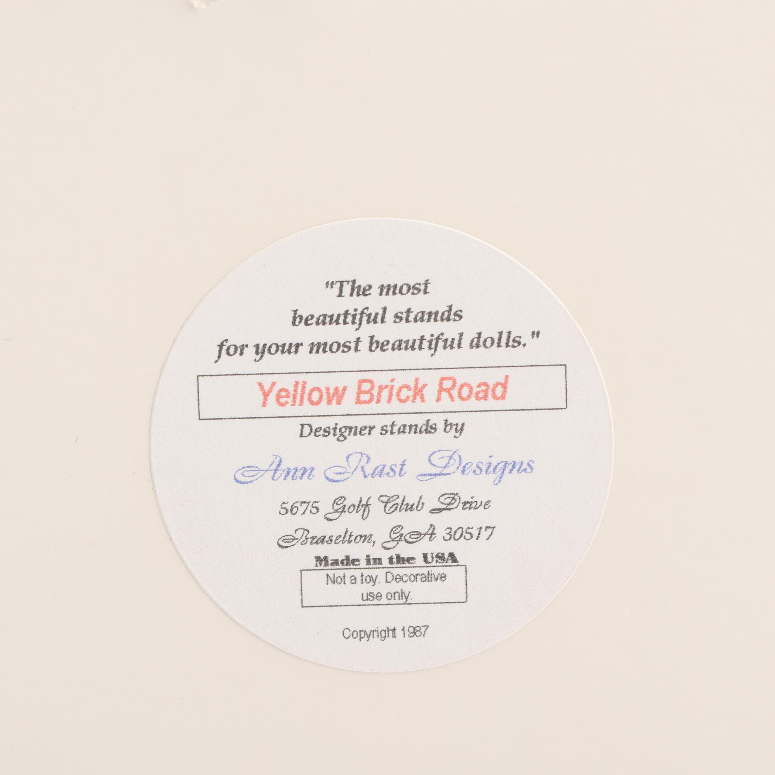 Madame Alexander "Wizard of Oz" Dollhouse and Ann Rast "Yellow Brick Road" Stand