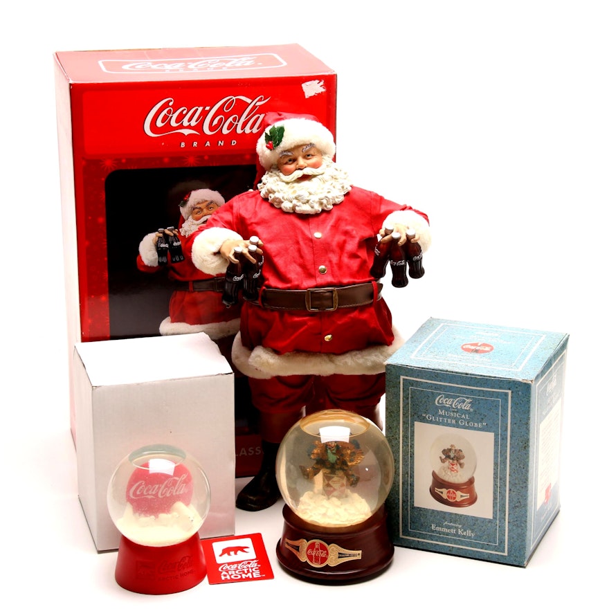 Coca-Cola Snow Globes and Santa Figurine