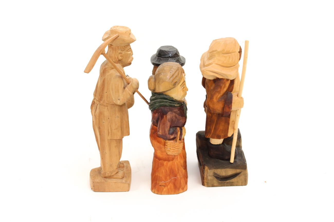 Three Carved Wooden Sculptures