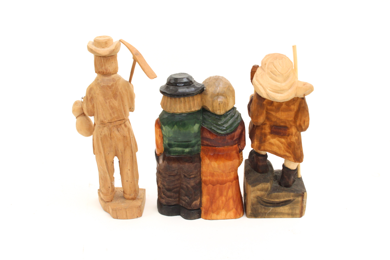 Three Carved Wooden Sculptures