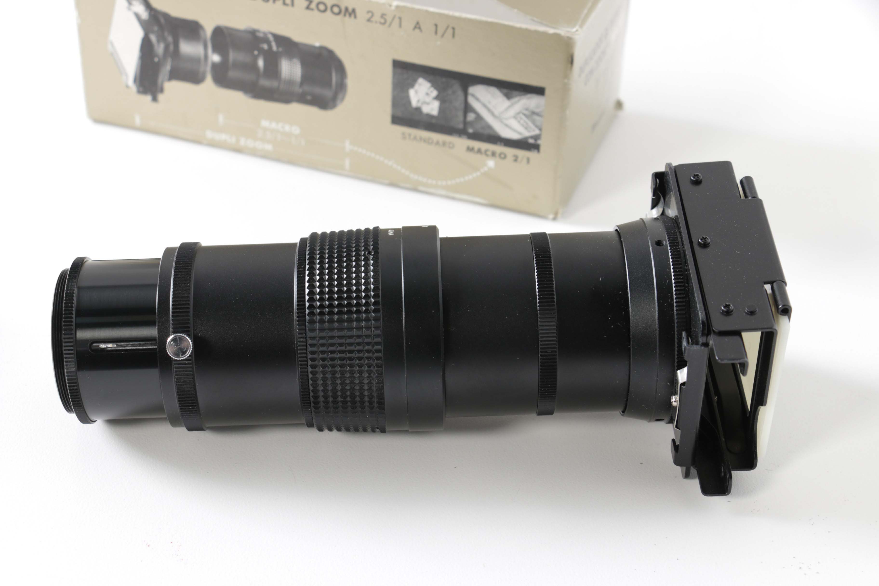 Camera Lenses and Flashes including Rokunar Zoom Slide Duplicator
