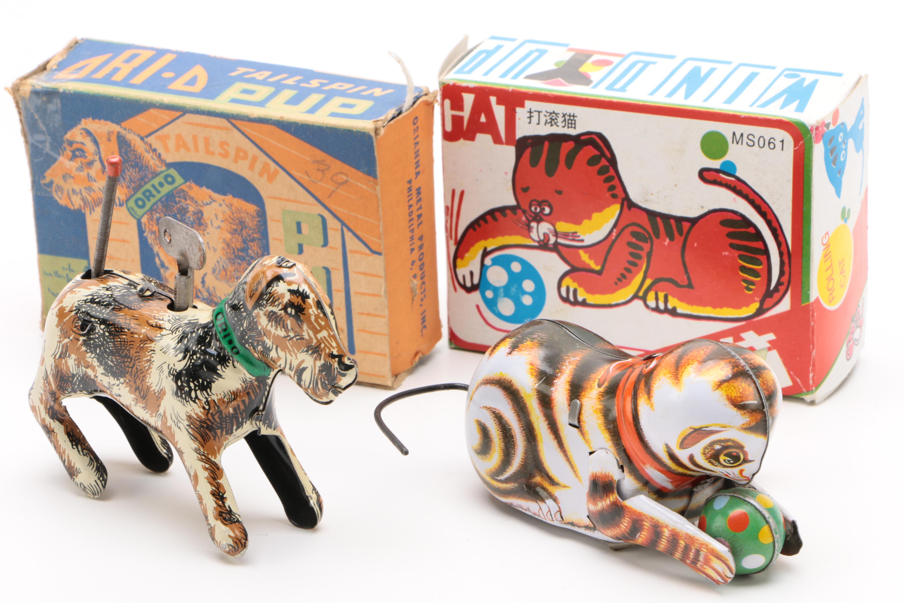 Vintage Tin Wind-Up Toys Including a Rolling Cat and "Tailspin Pup"