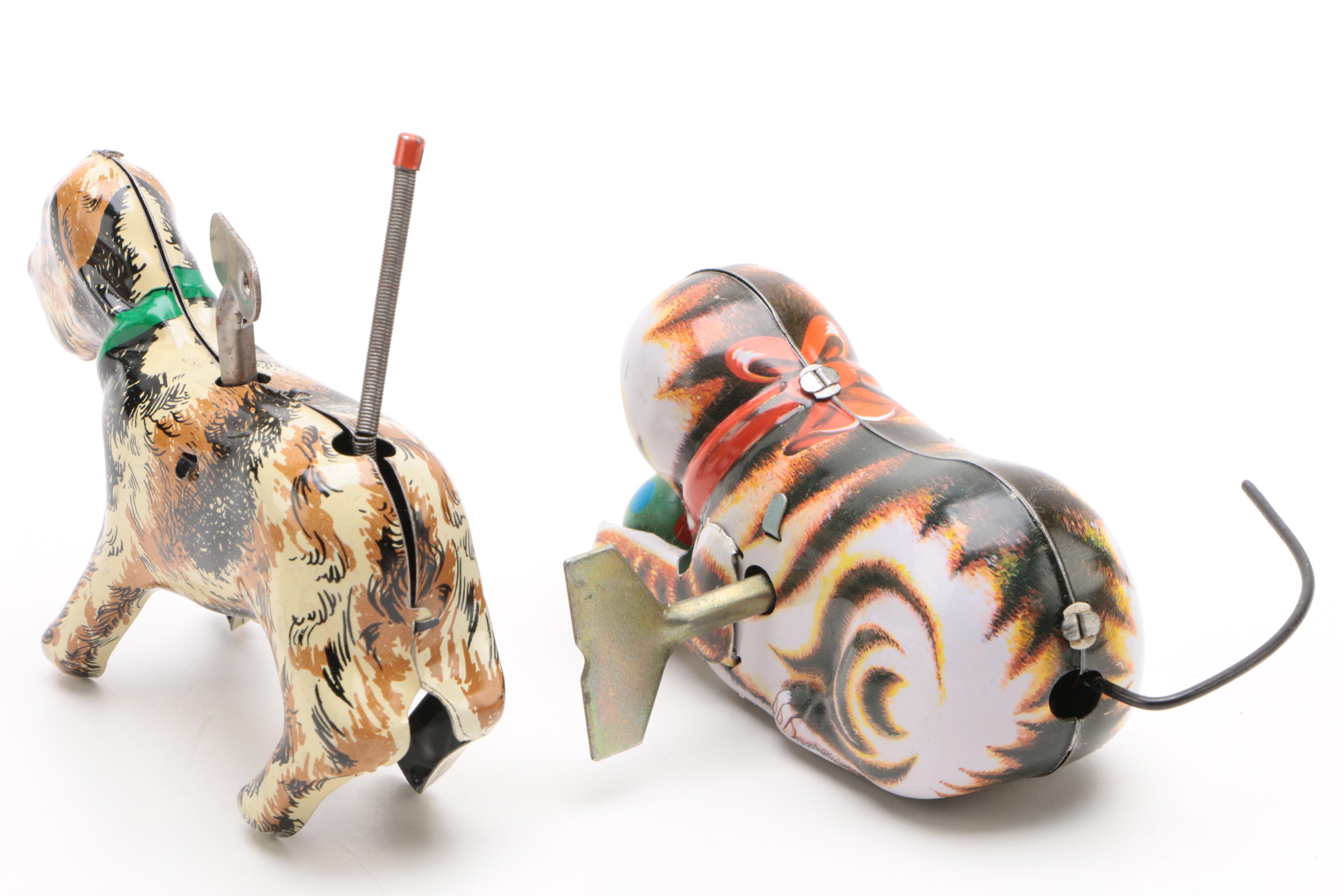 Vintage Tin Wind-Up Toys Including a Rolling Cat and "Tailspin Pup"