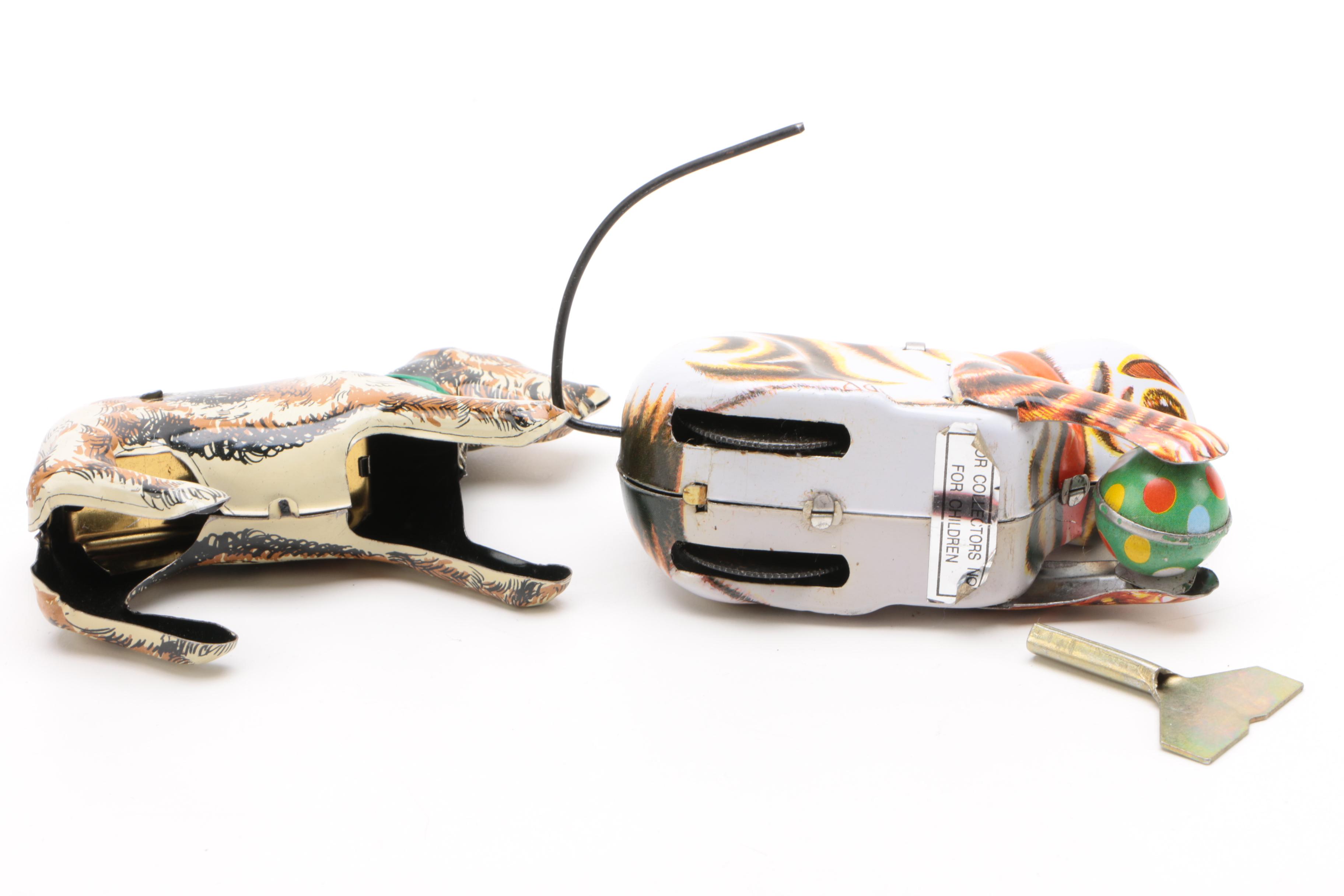 Vintage Tin Wind-Up Toys Including a Rolling Cat and "Tailspin Pup"