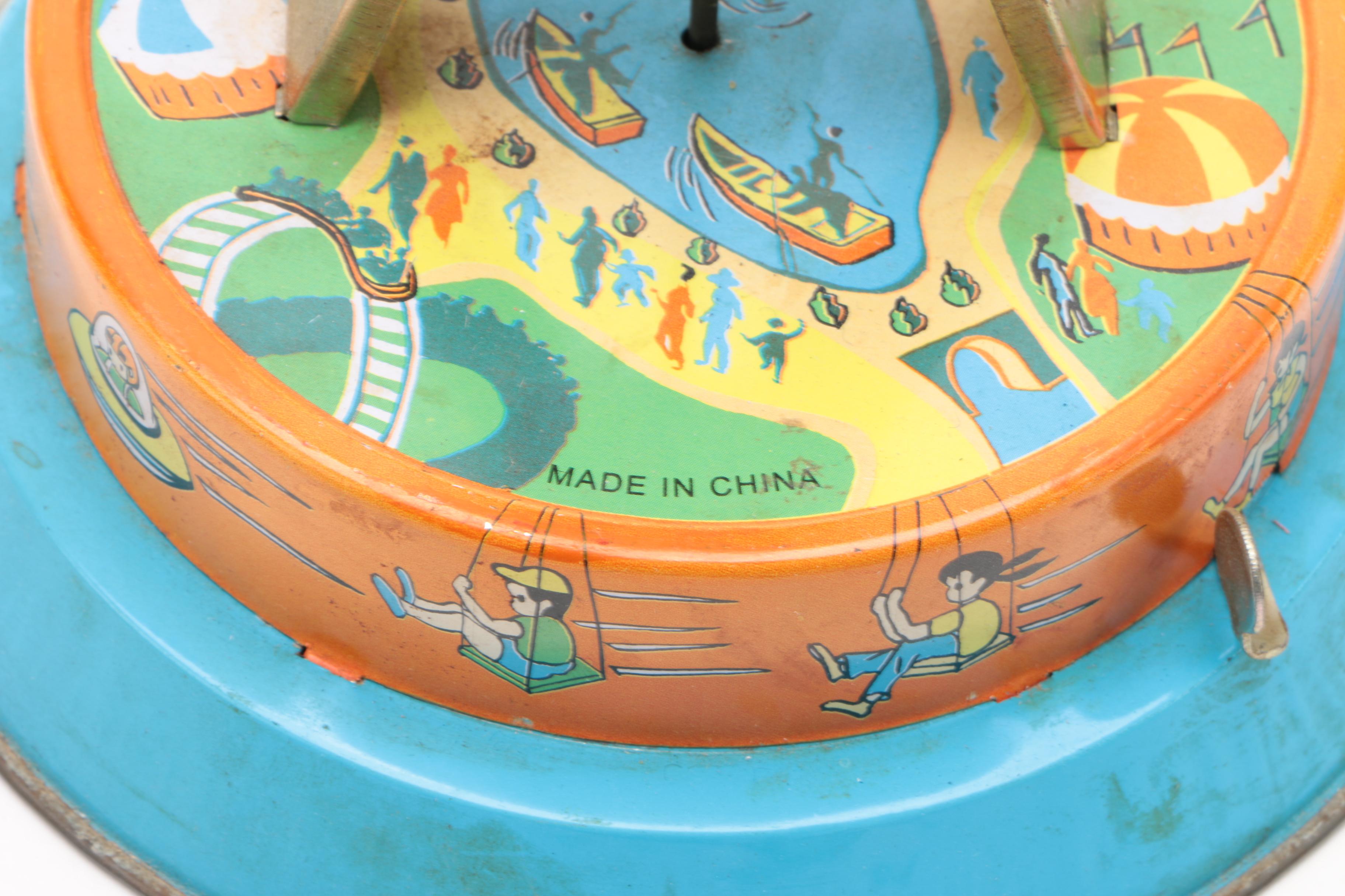 Vintage Tin Wind-Up Toys Including a Rolling Cat and "Tailspin Pup"