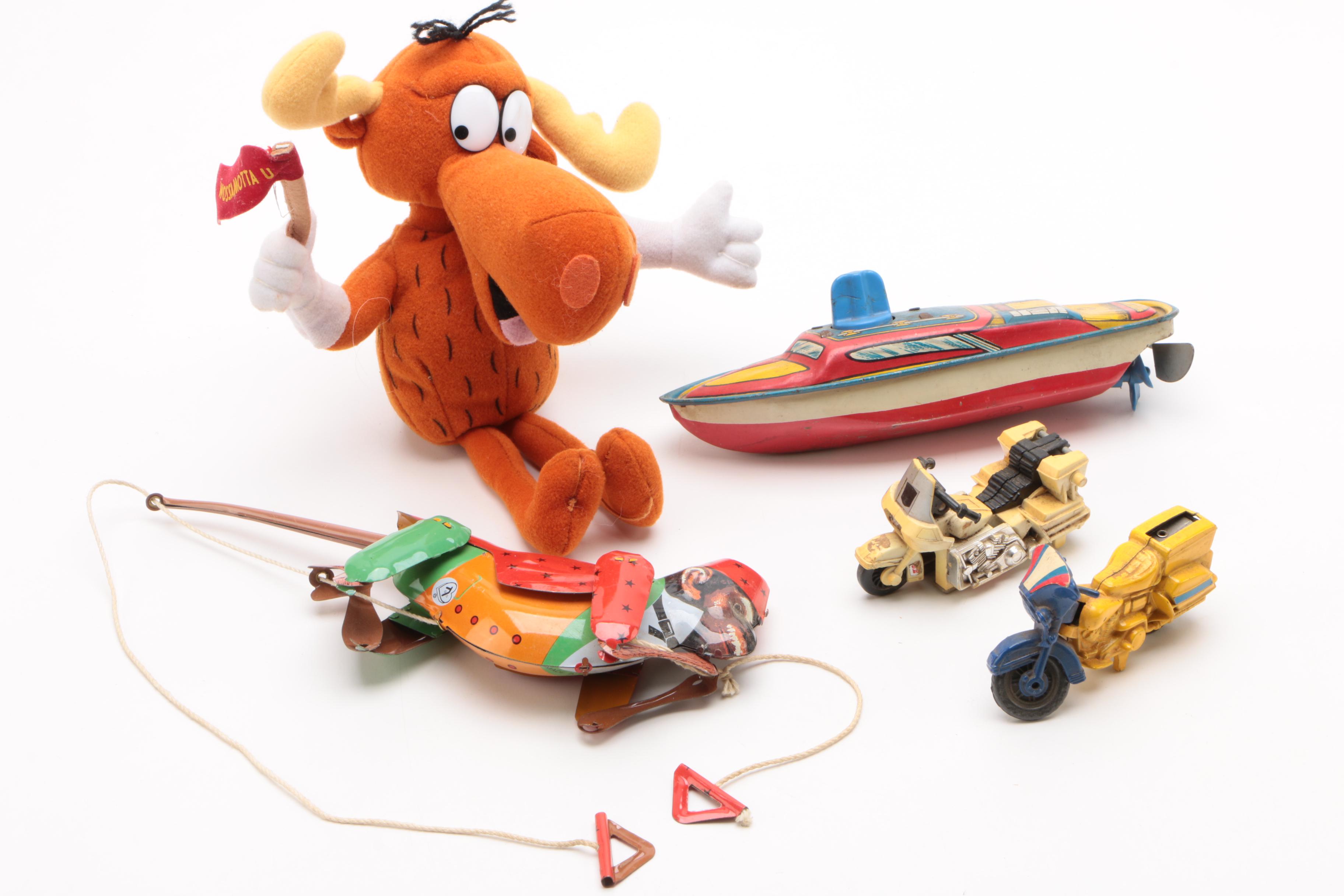 Vintage Tin Wind-Up Toys Including a Rolling Cat and "Tailspin Pup"