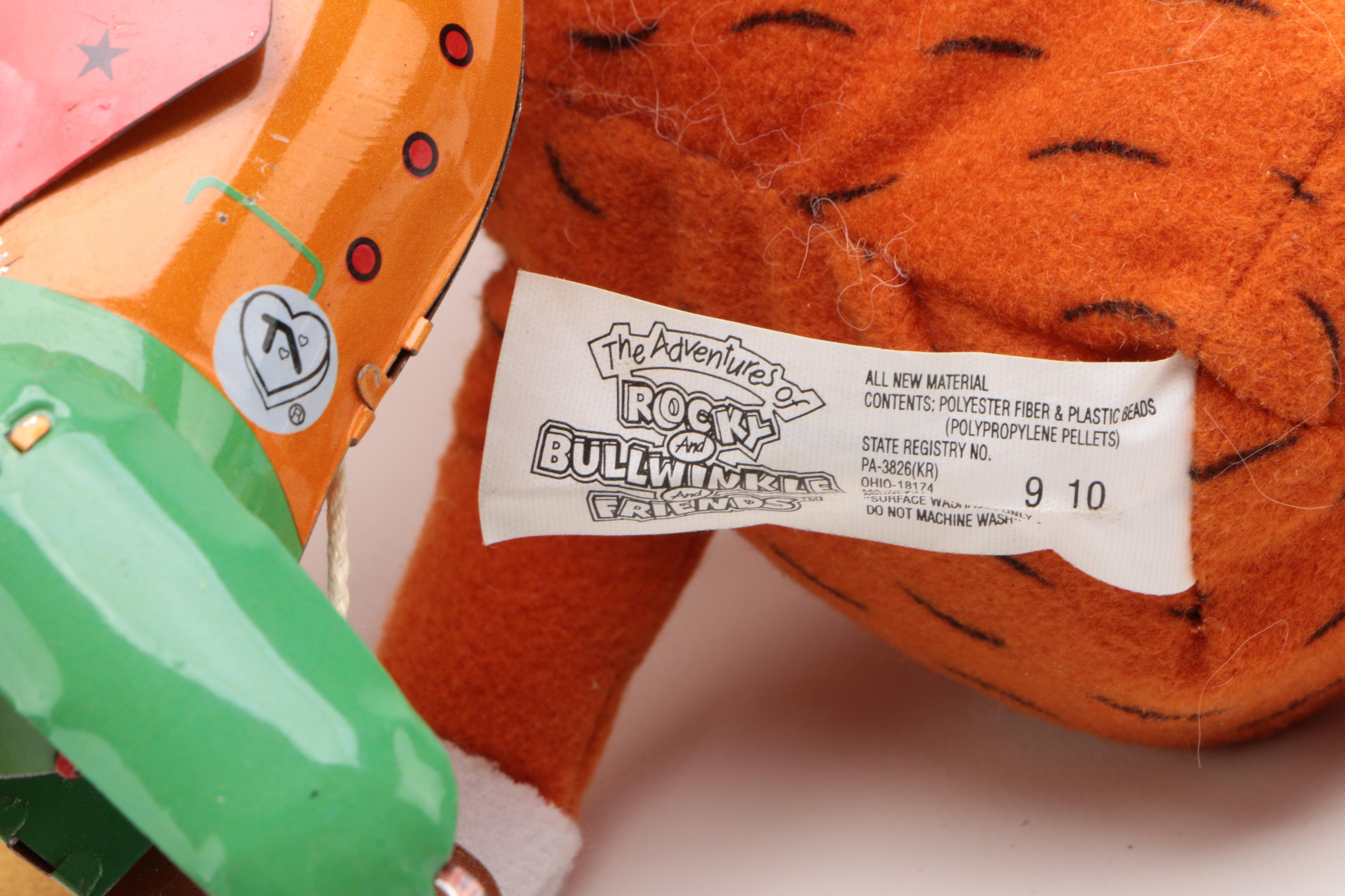 Vintage Tin Wind-Up Toys Including a Rolling Cat and "Tailspin Pup"