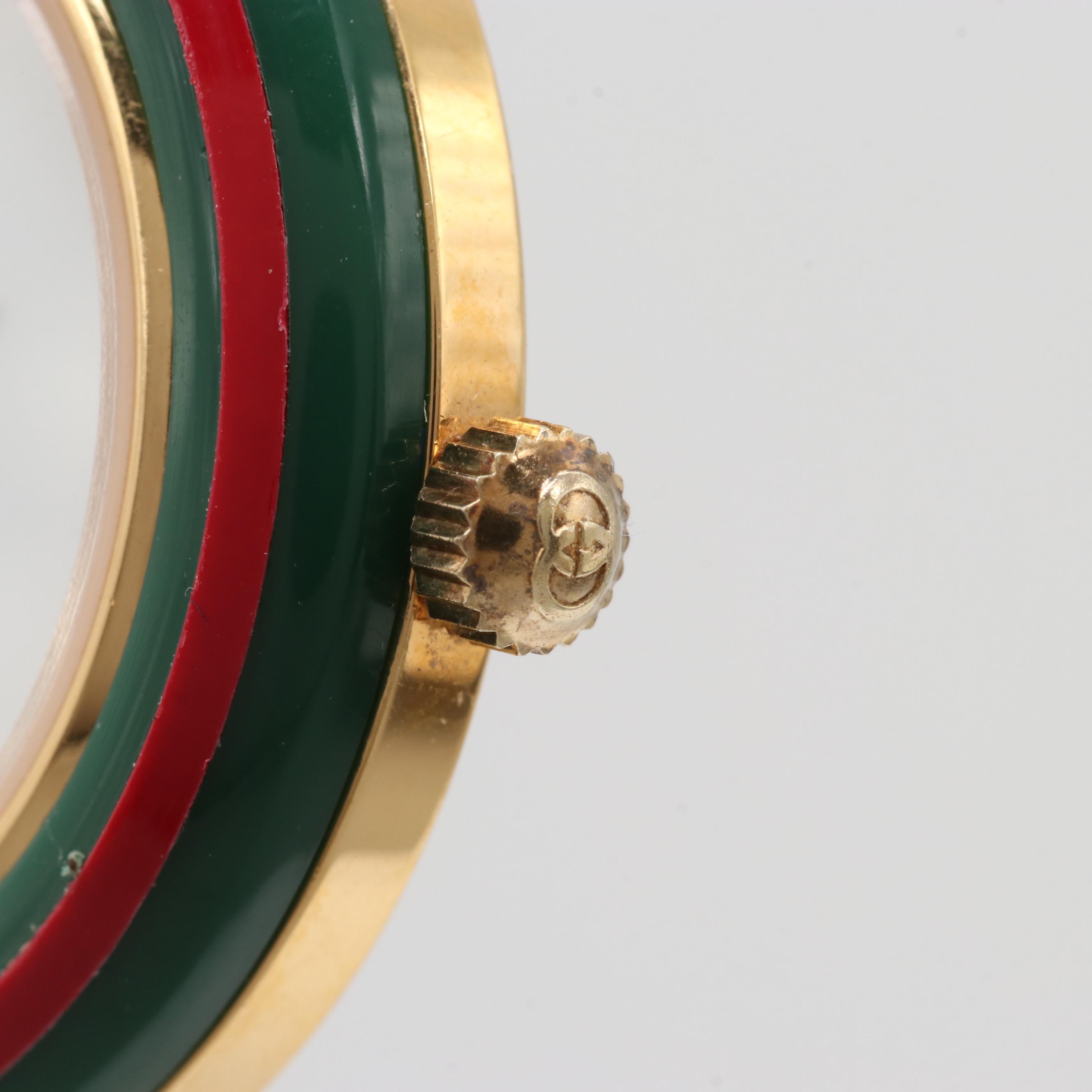 Gucci 1100-L Gold Tone Quartz Watch With Interchangeable Bezels