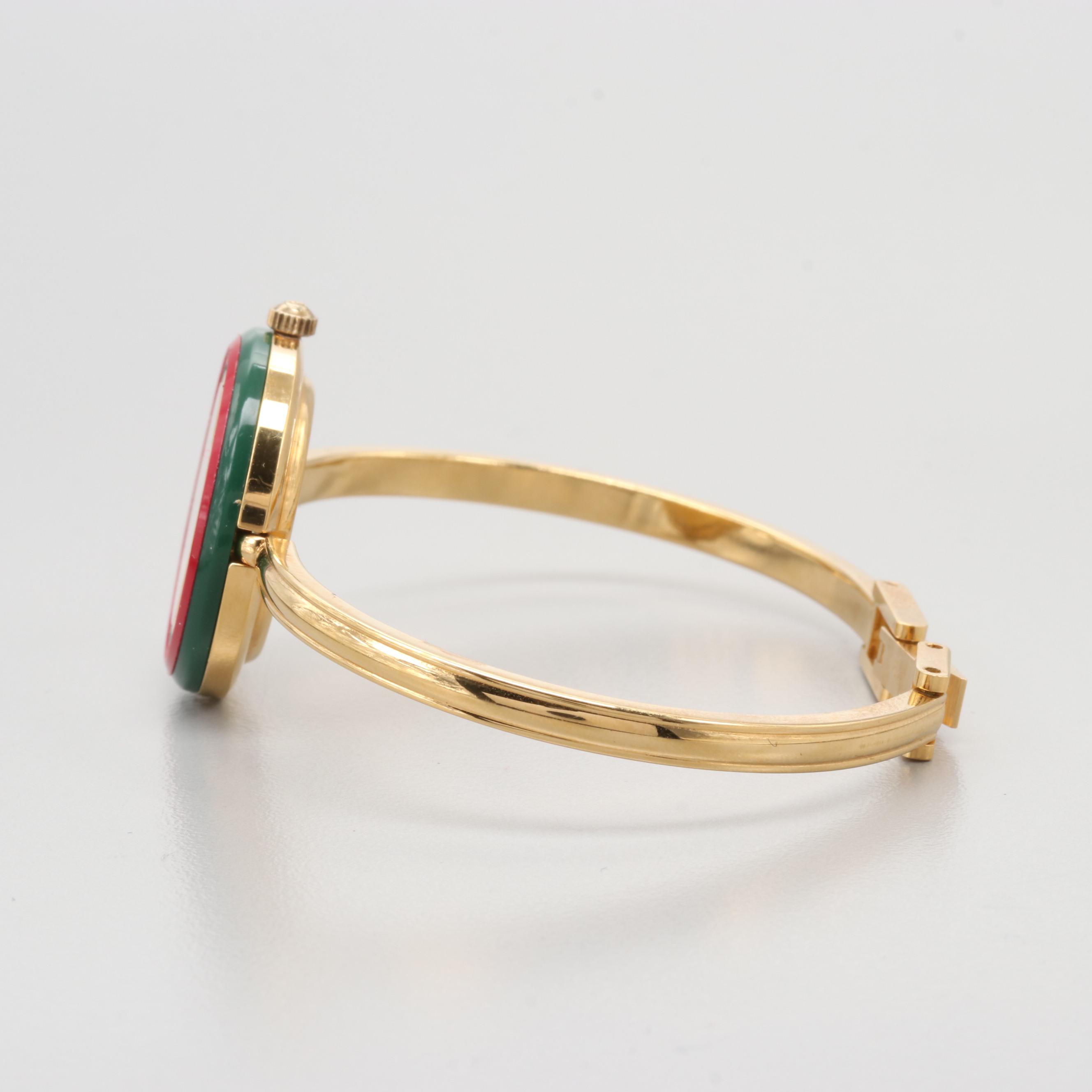 Gucci 1100-L Gold Tone Quartz Watch With Interchangeable Bezels