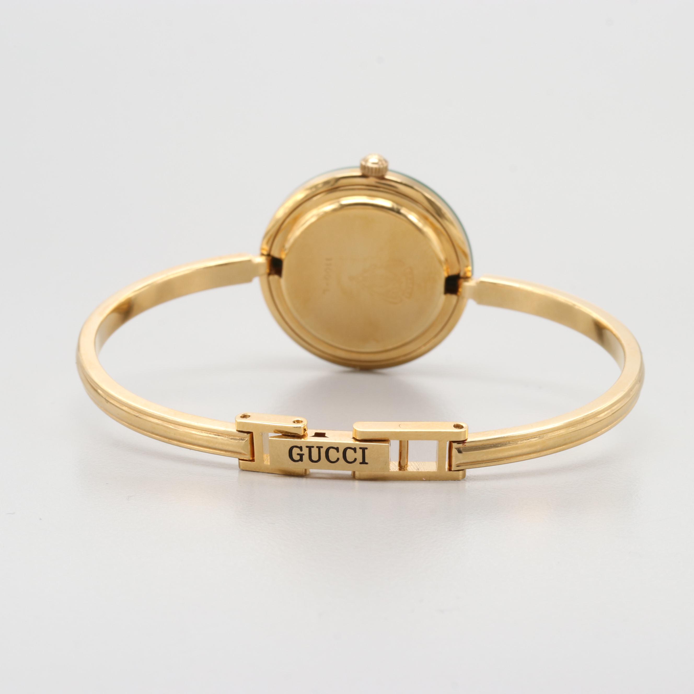 Gucci 1100-L Gold Tone Quartz Watch With Interchangeable Bezels