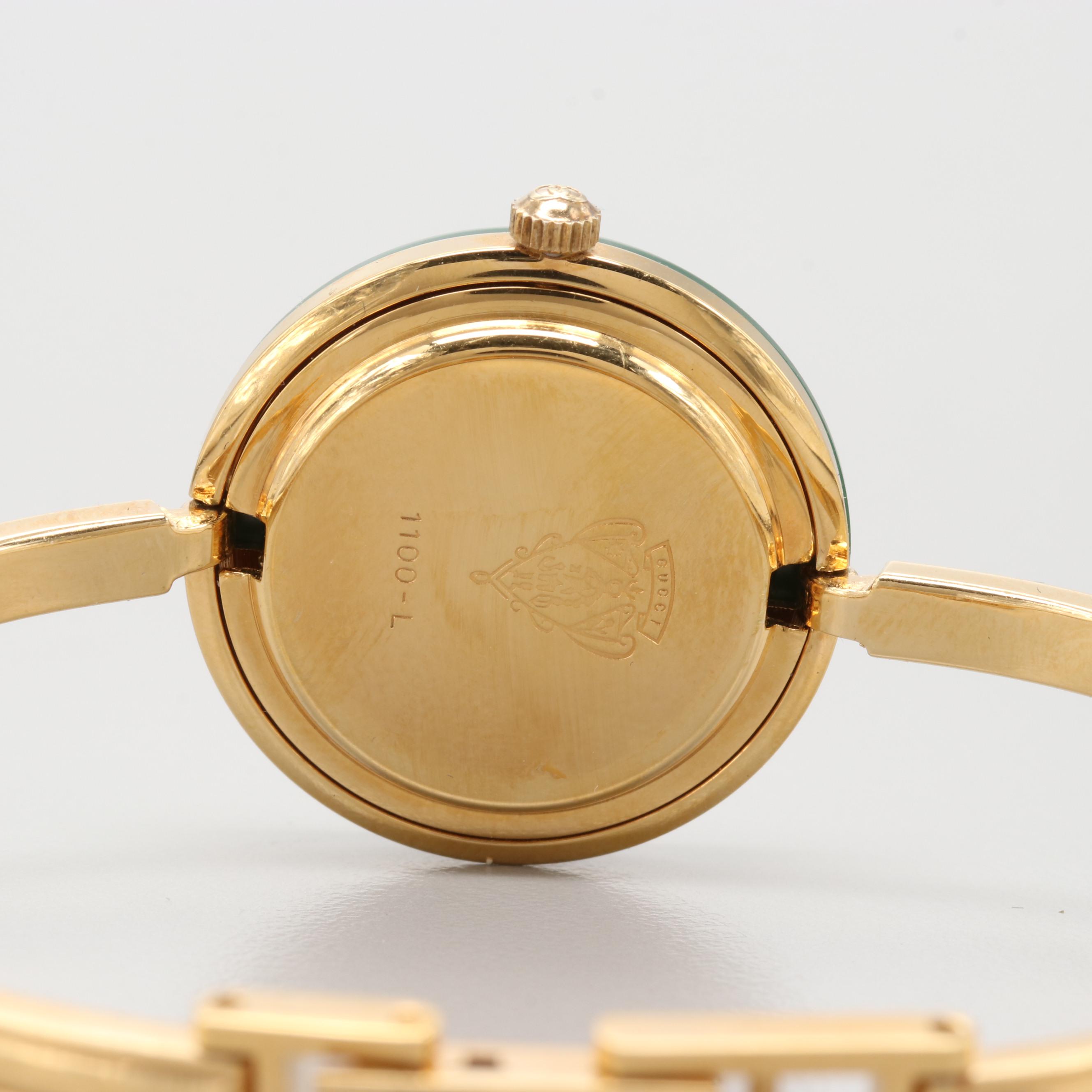 Gucci 1100-L Gold Tone Quartz Watch With Interchangeable Bezels