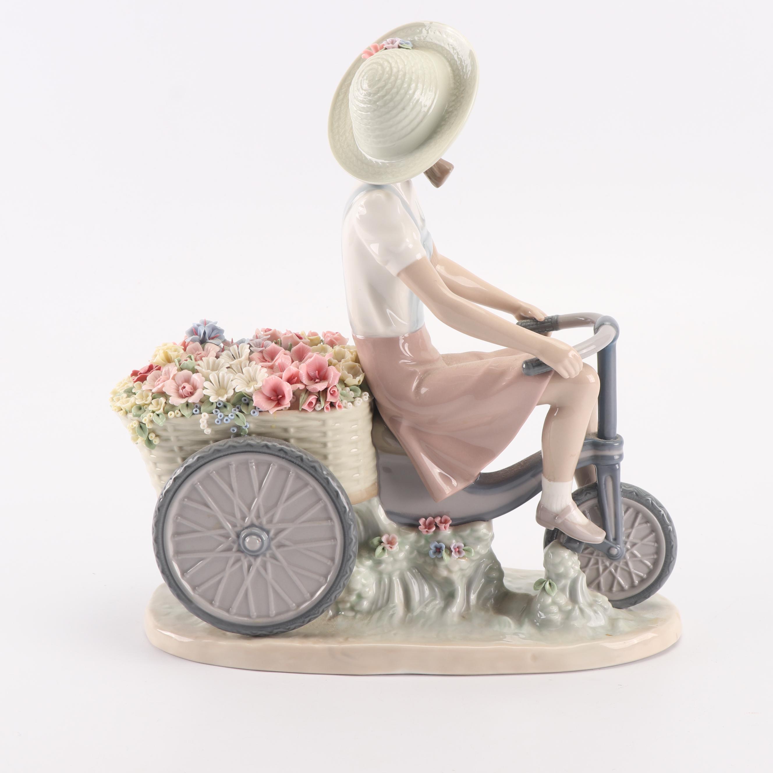 Lladró "Girl with Flowers in Tow" Porcelain Figurine