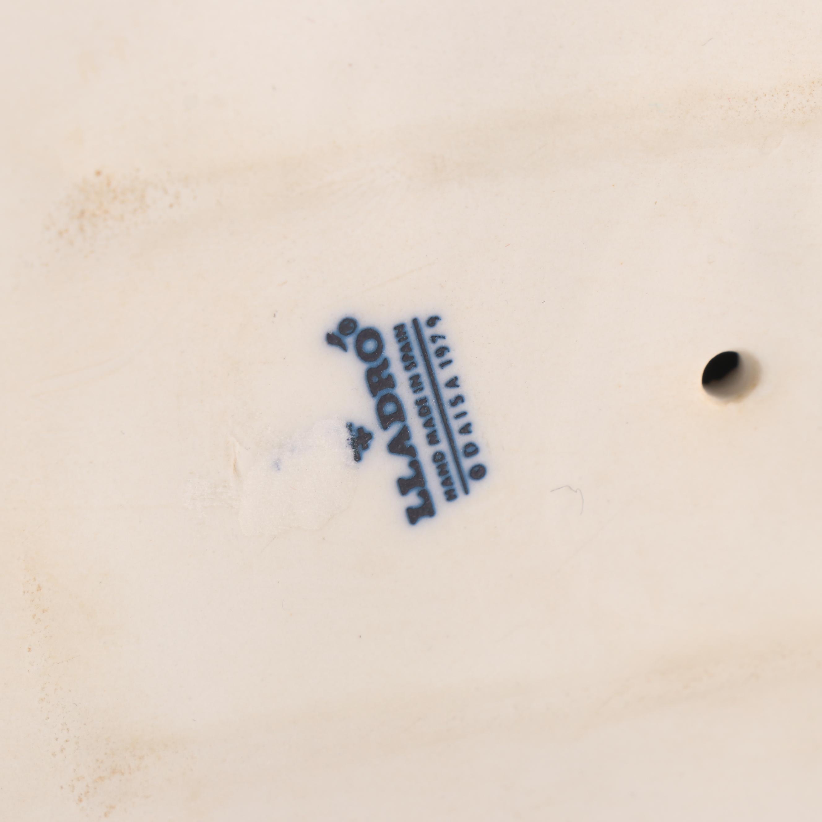 Lladró "Girl with Flowers in Tow" Porcelain Figurine