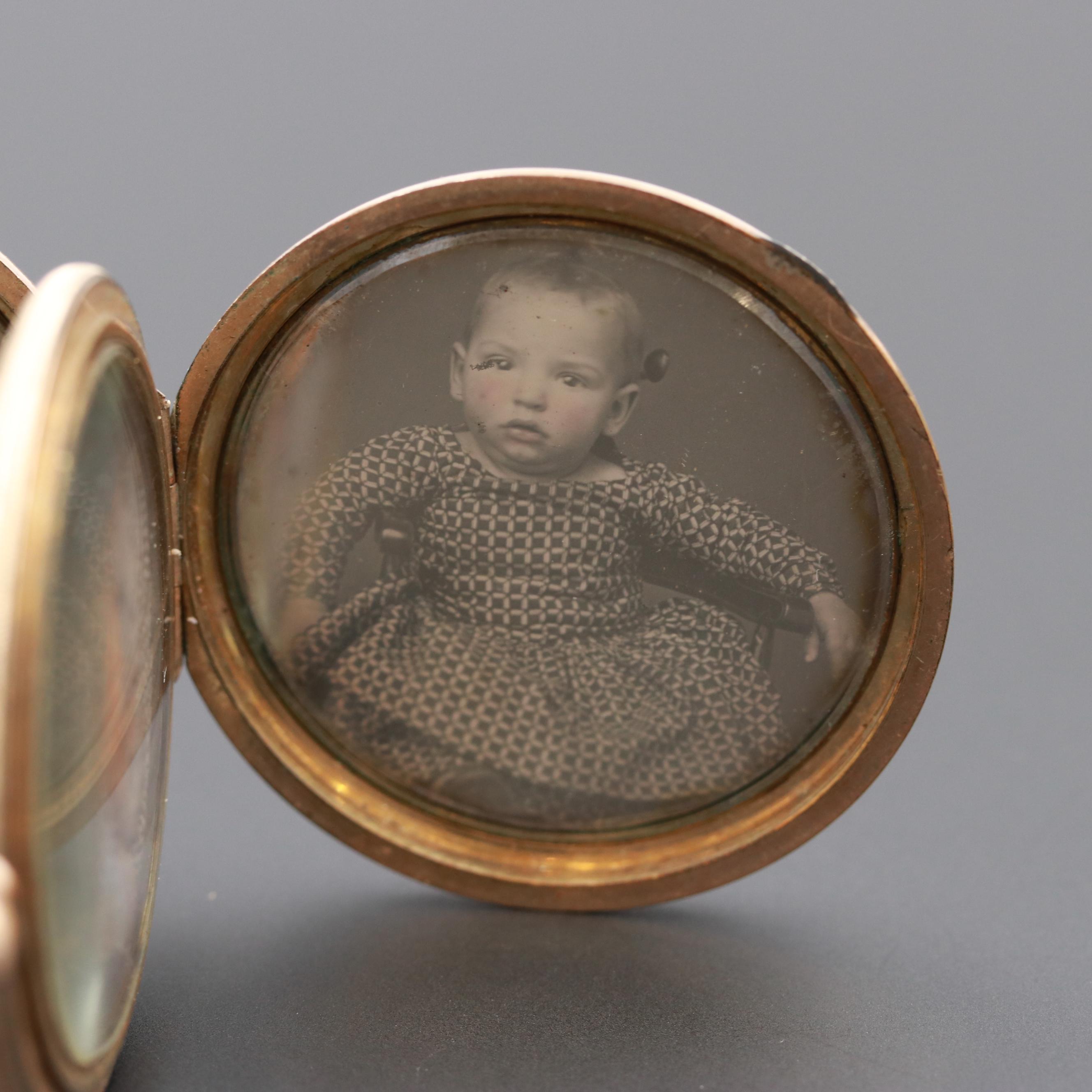 Pocket Watch Style Locket with Four Vintage Photographs