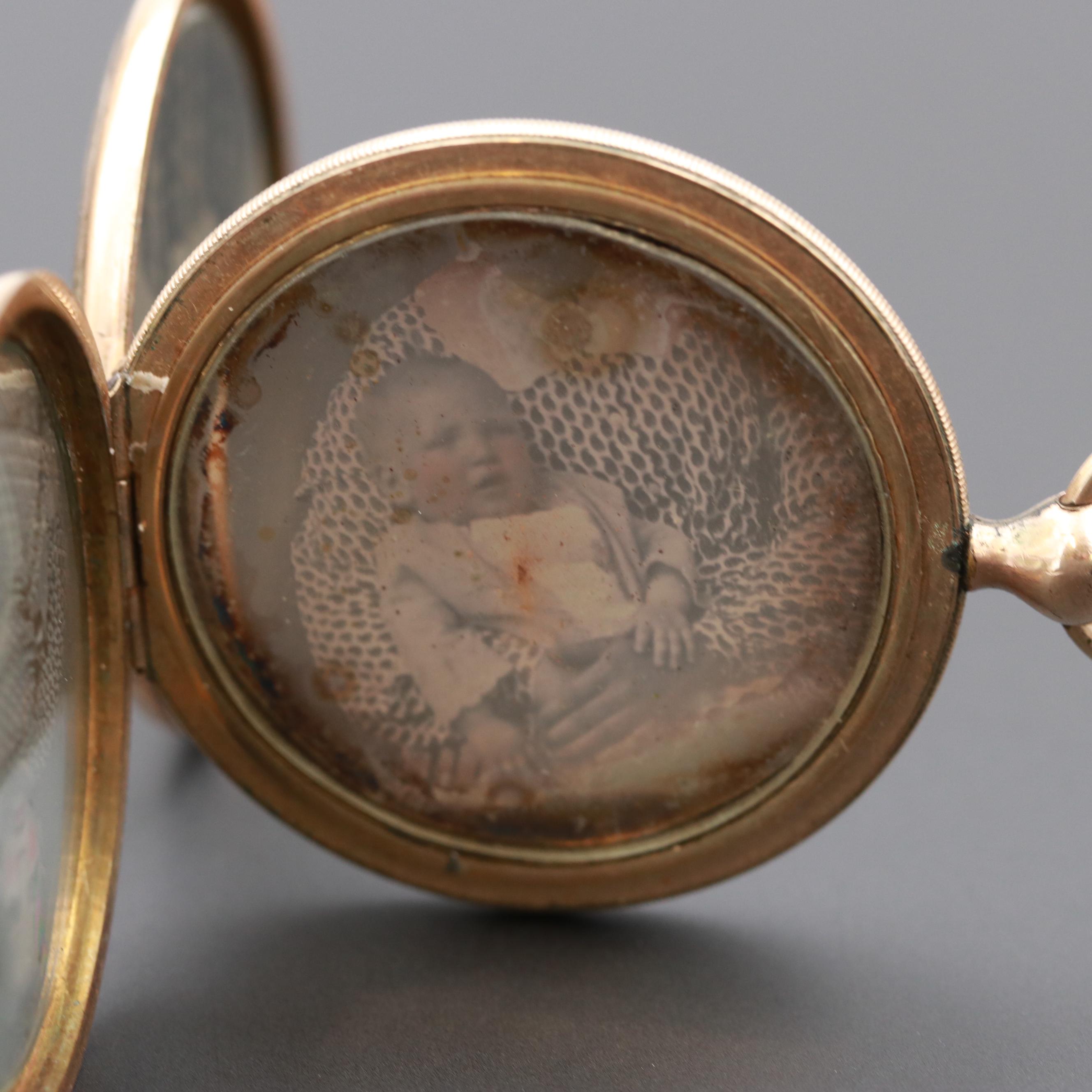 Pocket Watch Style Locket with Four Vintage Photographs