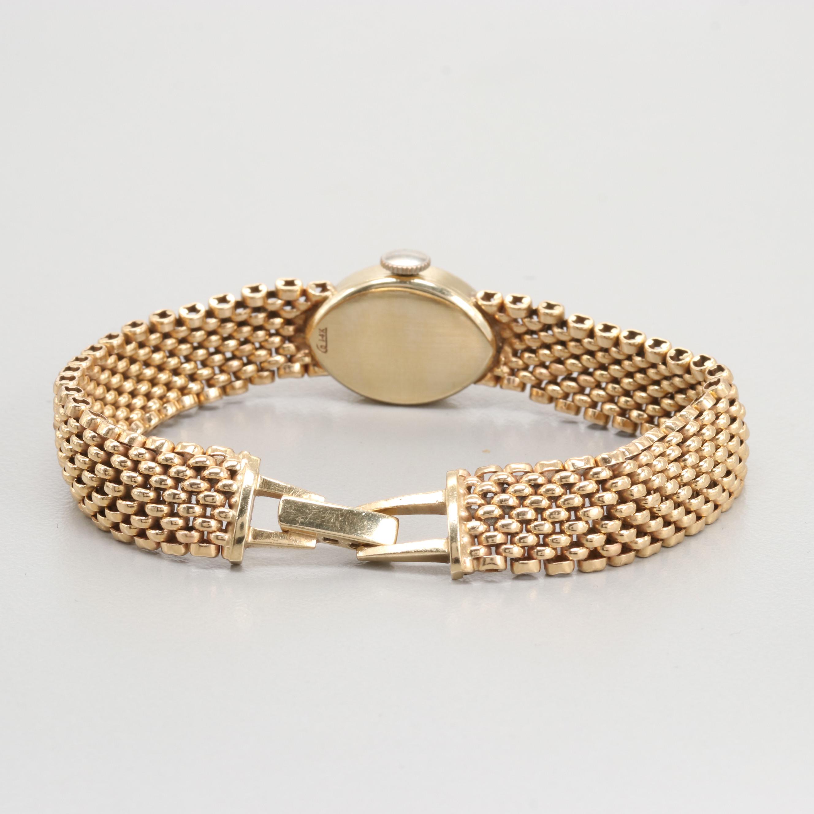 Vintage Rolex 14K Yellow Gold Stem Wind Watch on Panther Link Bracelet