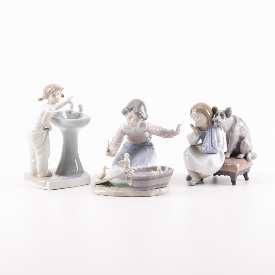Lladró "We Can't Play", "It's Your Turn" and "Clean Up Time" Porcelain Figurines