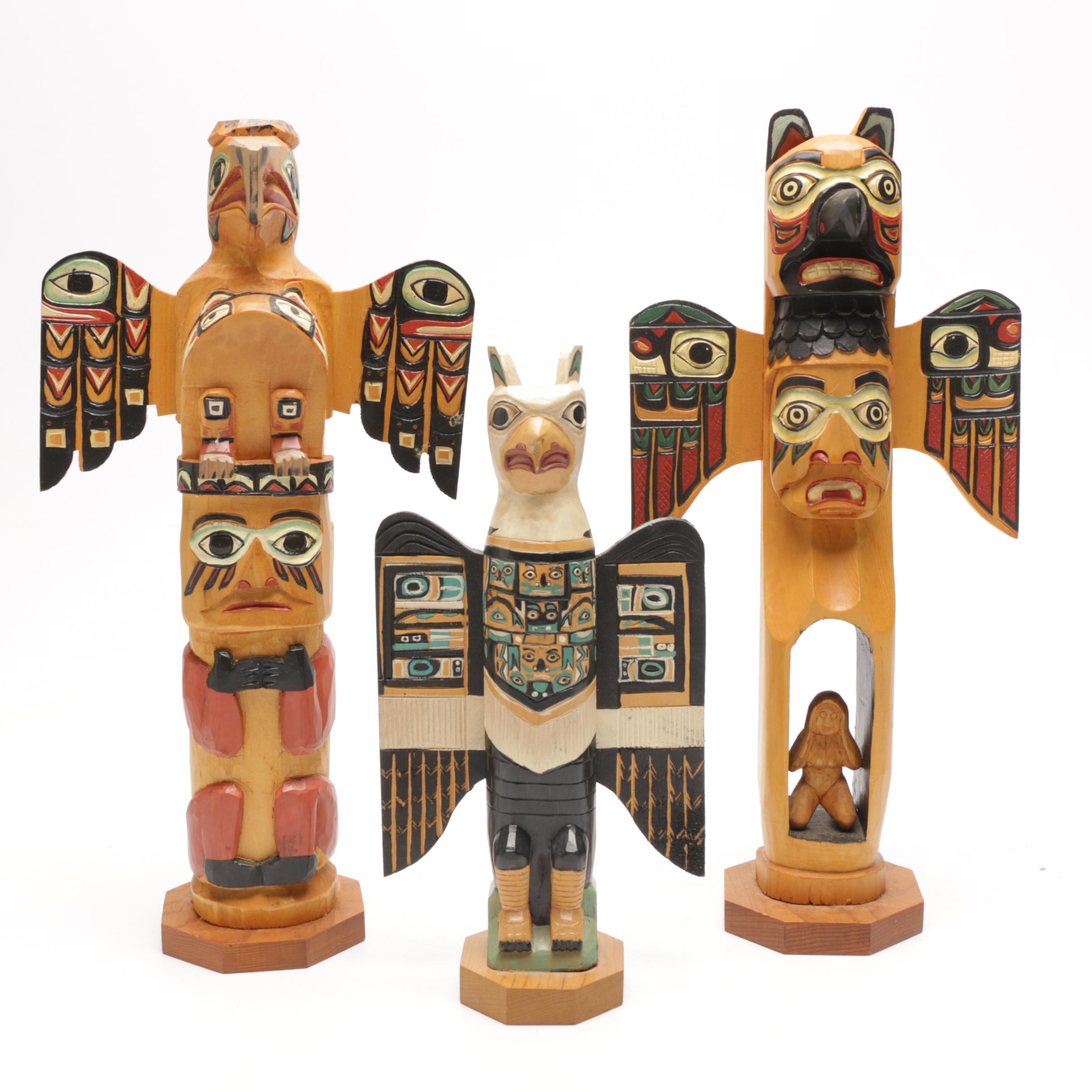 Three Carved Wood Totem Pole Sculptures