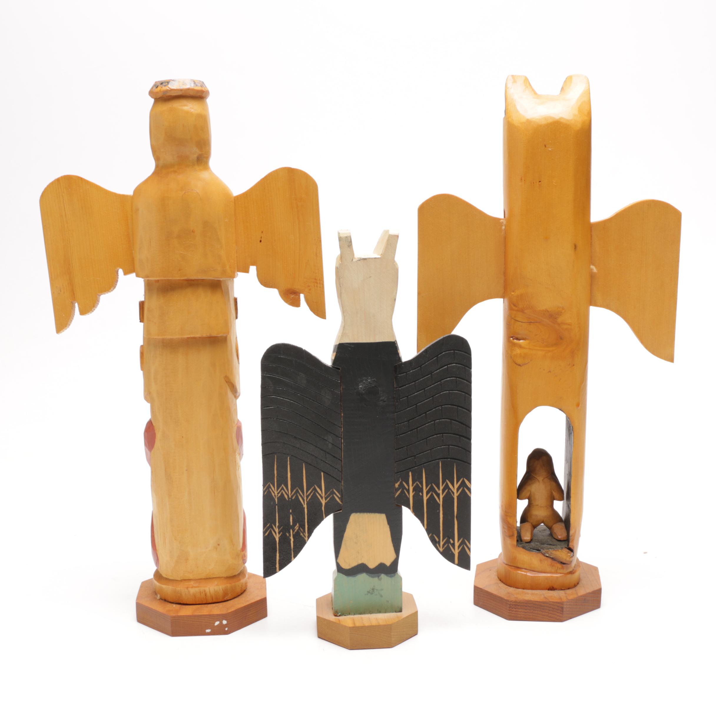 Three Carved Wood Totem Pole Sculptures