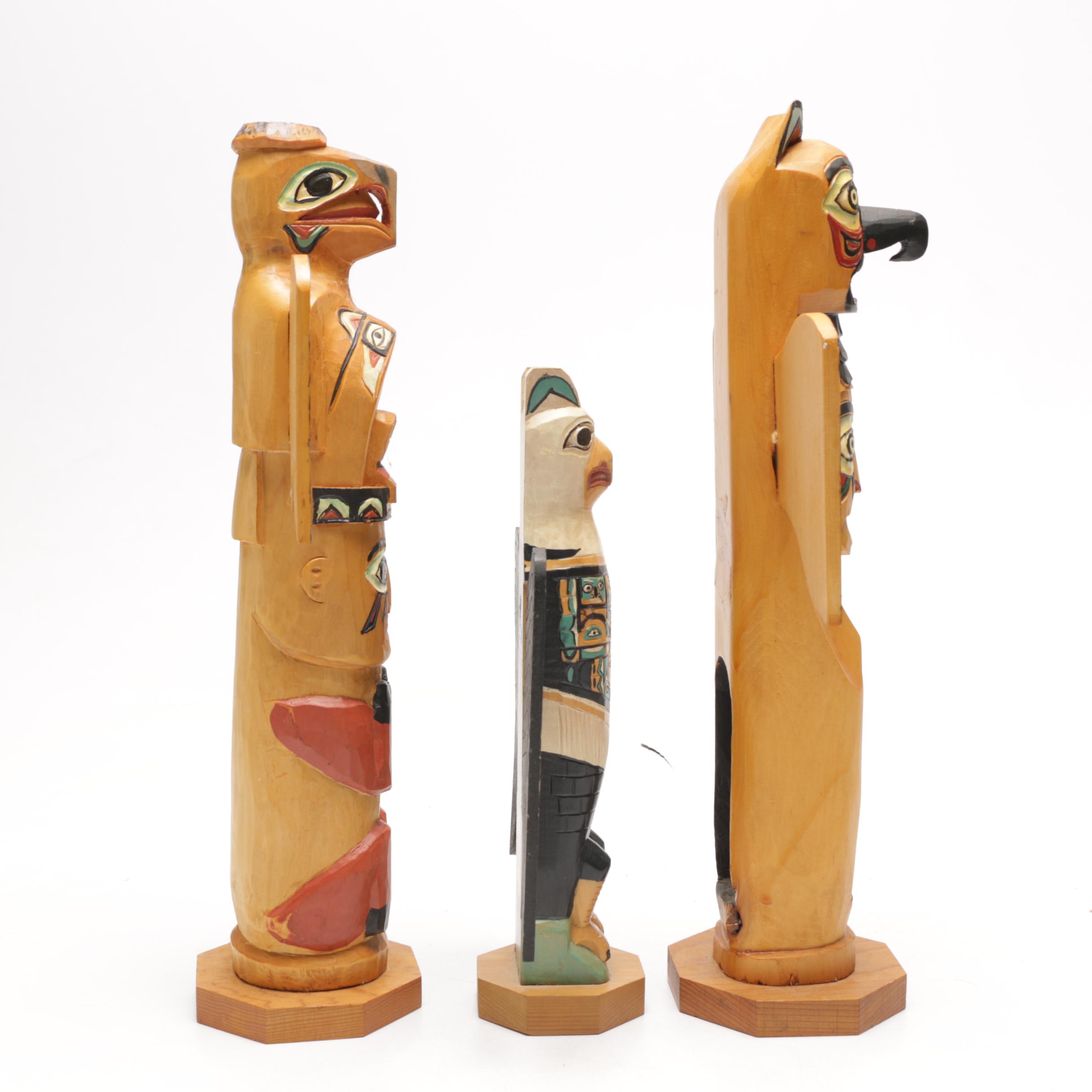 Three Carved Wood Totem Pole Sculptures