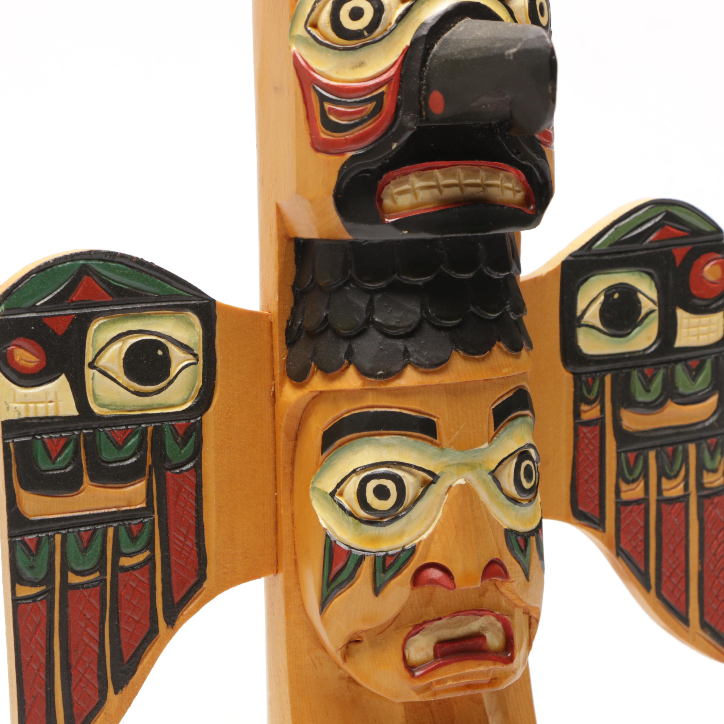 Three Carved Wood Totem Pole Sculptures