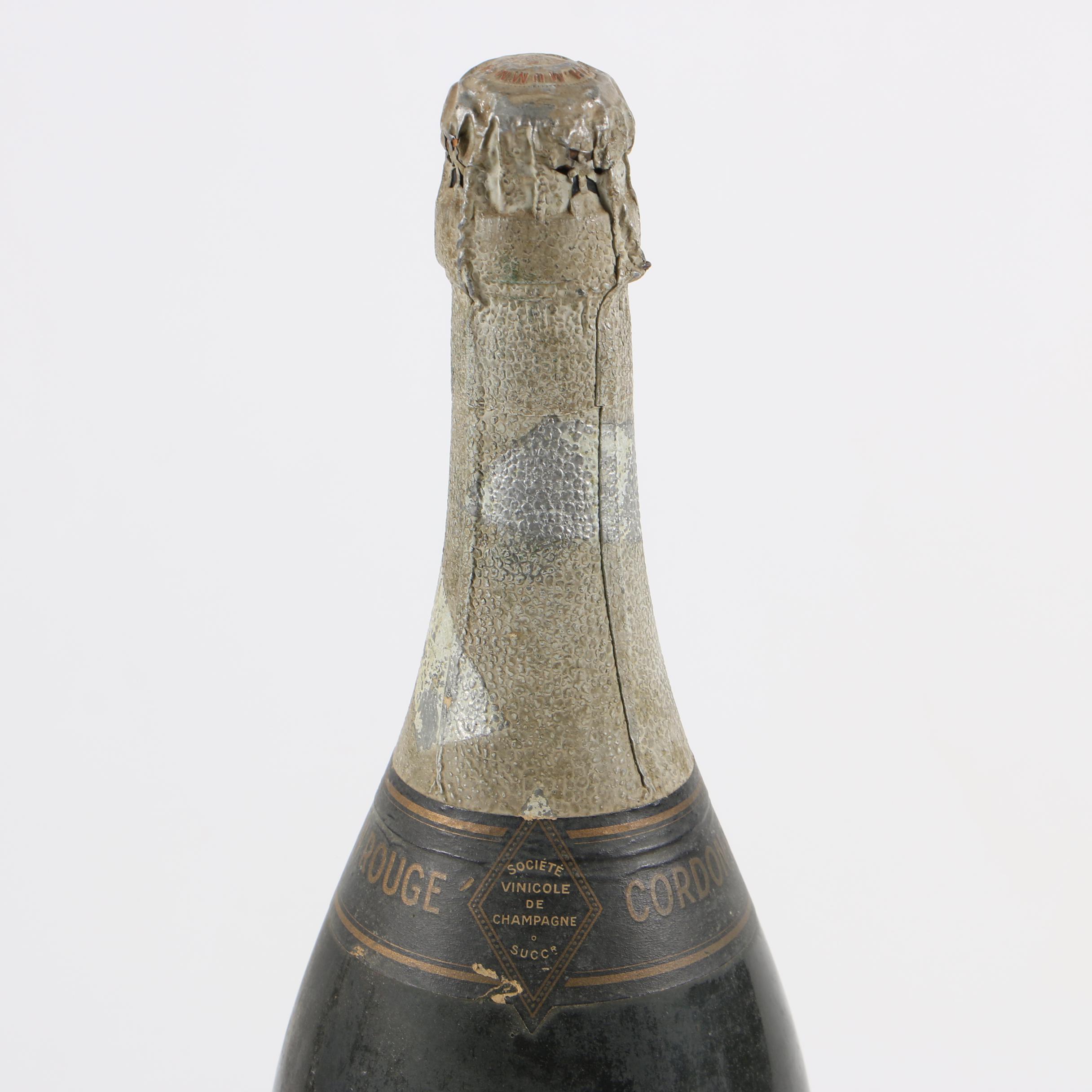 Piper-Heidsieck and Mumm Gordon Rouge Champagne Bottles