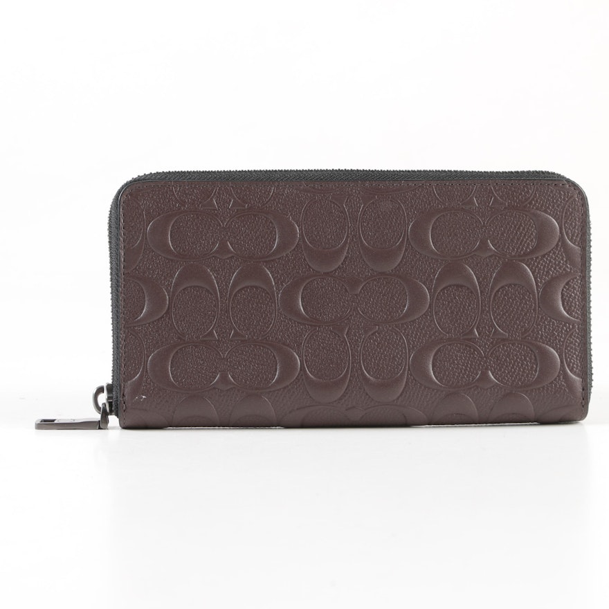 Coach Signature Embossed Brown Leather Zip Wallet