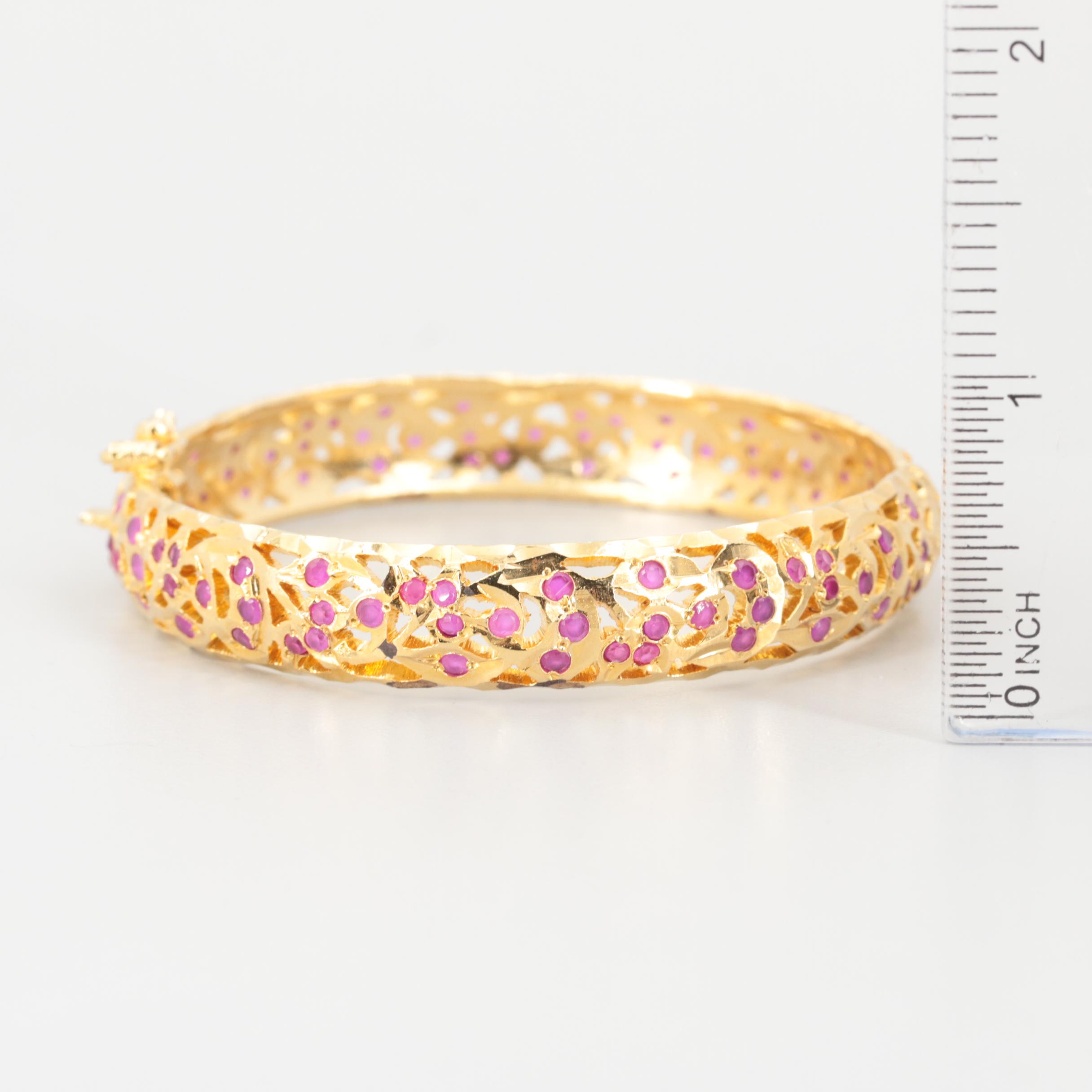 Gold Tone Synthetic Ruby Hinged Bangle Bracelet