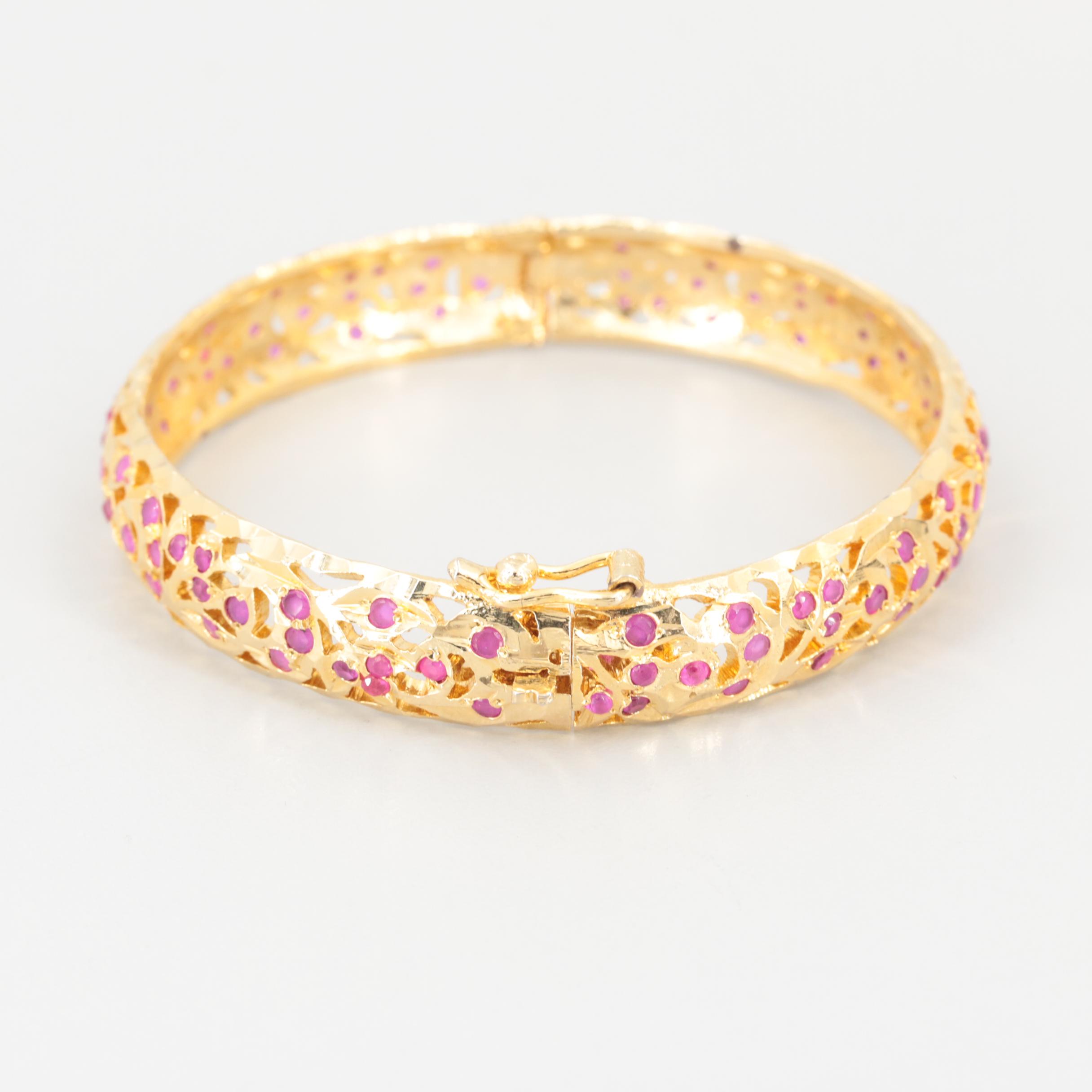 Gold Tone Synthetic Ruby Hinged Bangle Bracelet