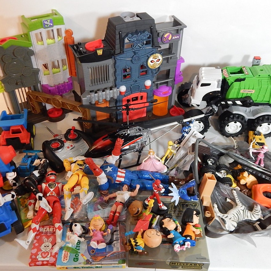 Assorted Toy Lot with Transformers, R/C Helicopter, Power Rangers,Batman Playset