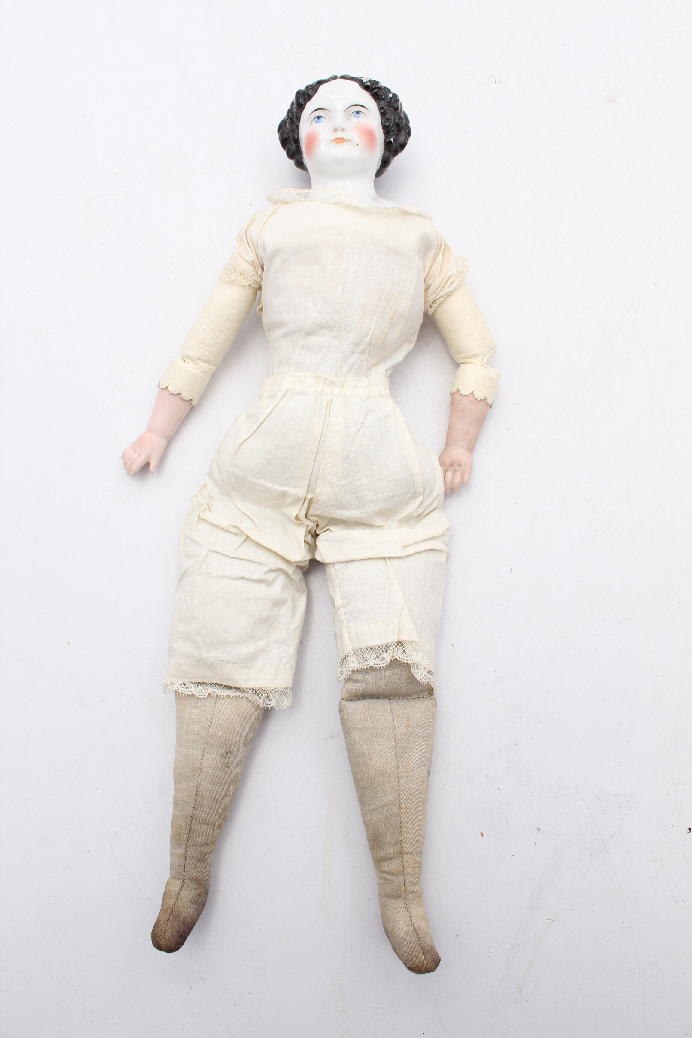 Antique Porcelain, Bisque and Cloth Doll
