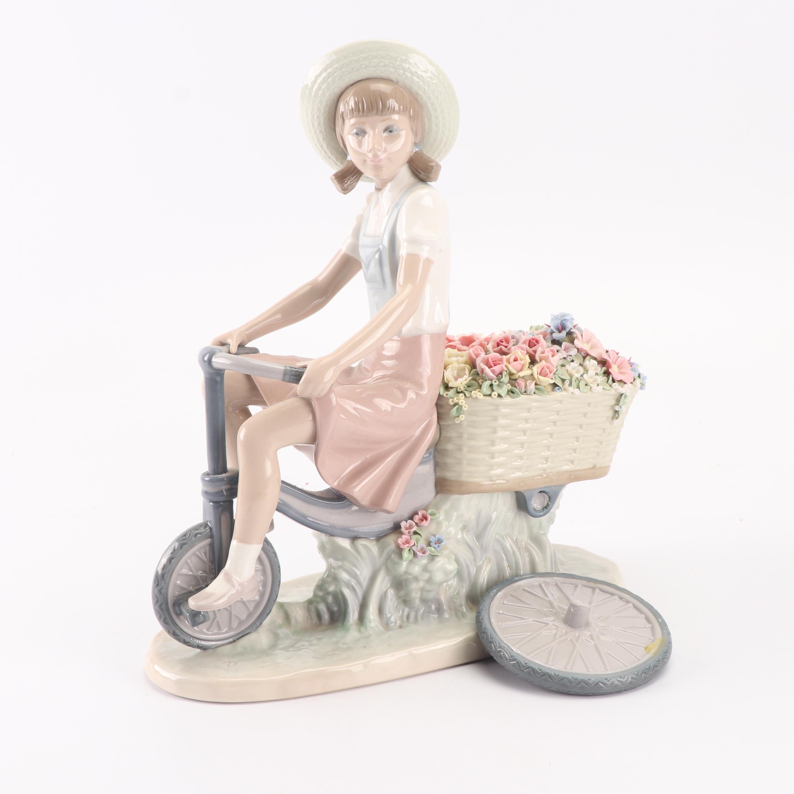Lladró "Girl with Flowers in Tow" Porcelain Figurine