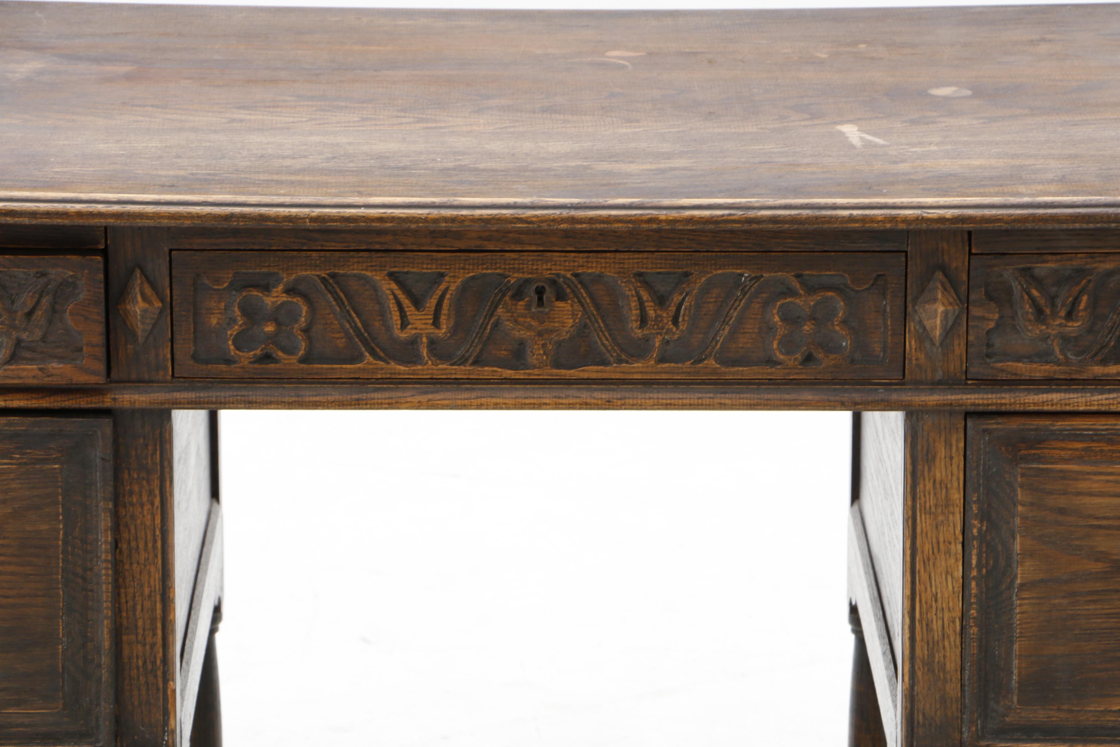 Early 1900s English Jacobean Revival Oak Desk and Chair