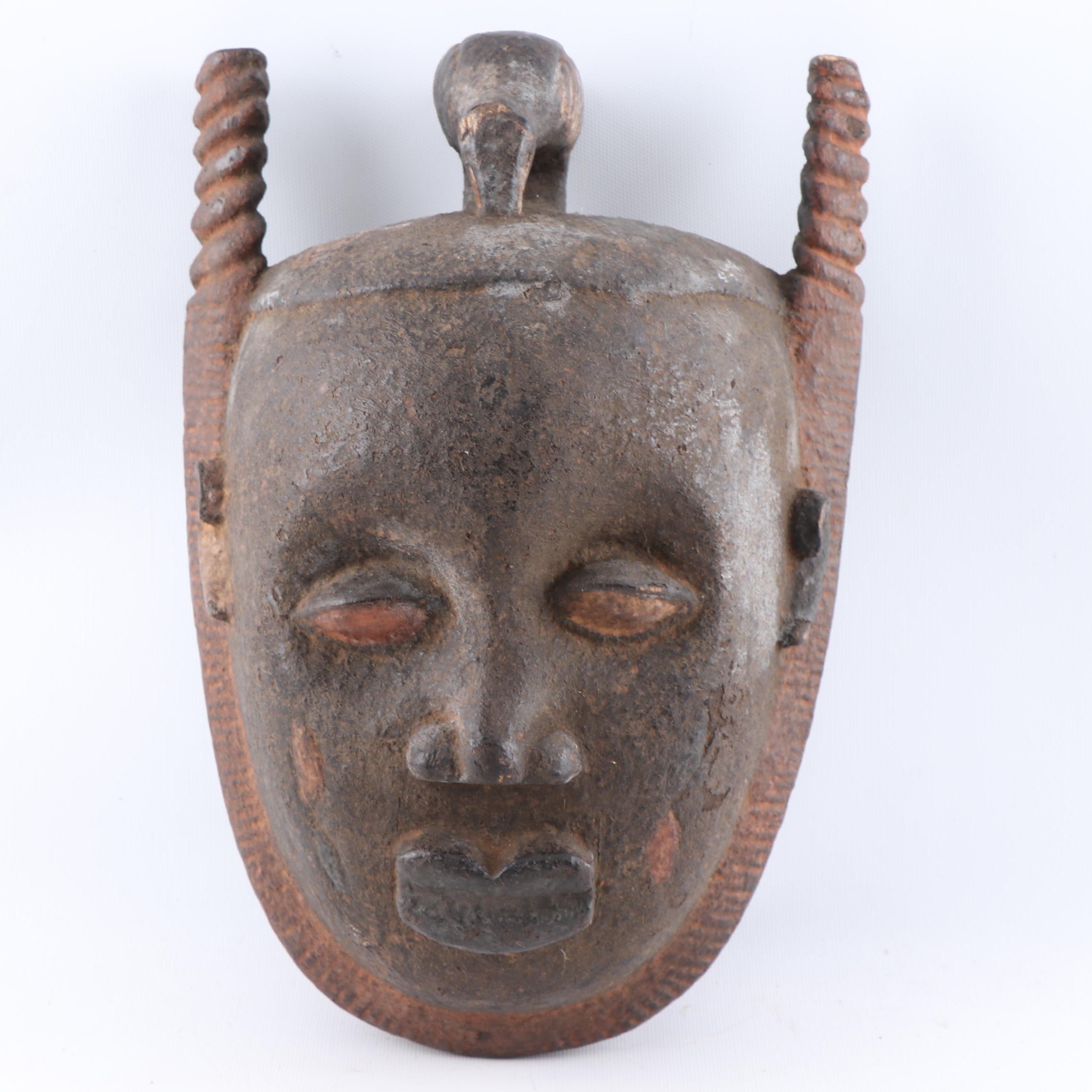 West African and Filipino Wood Masks