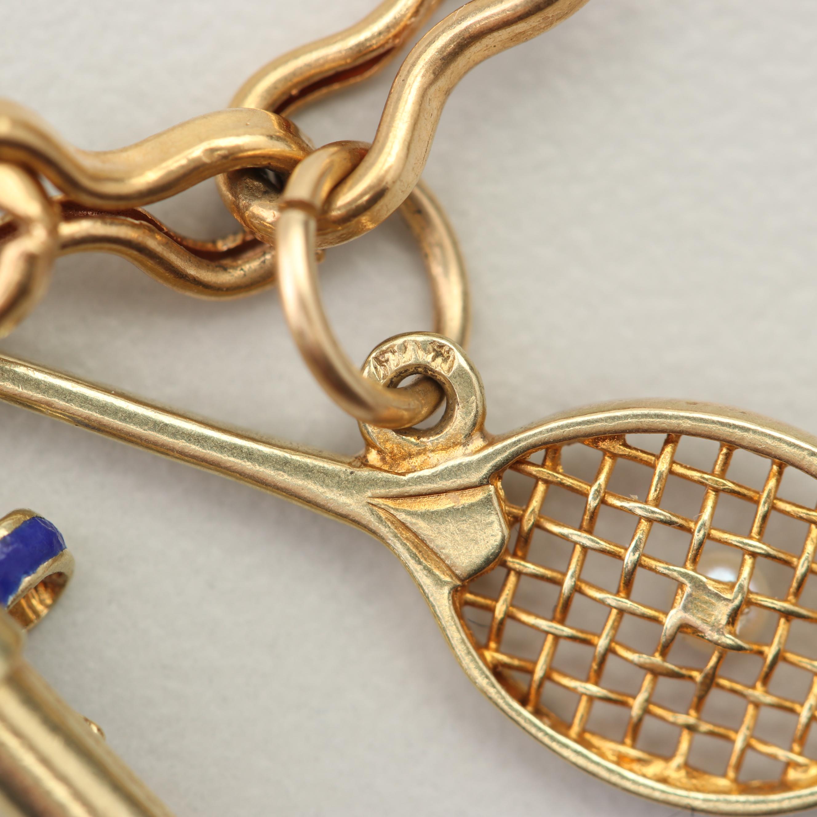 18K Yellow Gold Charm Bracelet with 14K and 10K Yellow Gold Charms