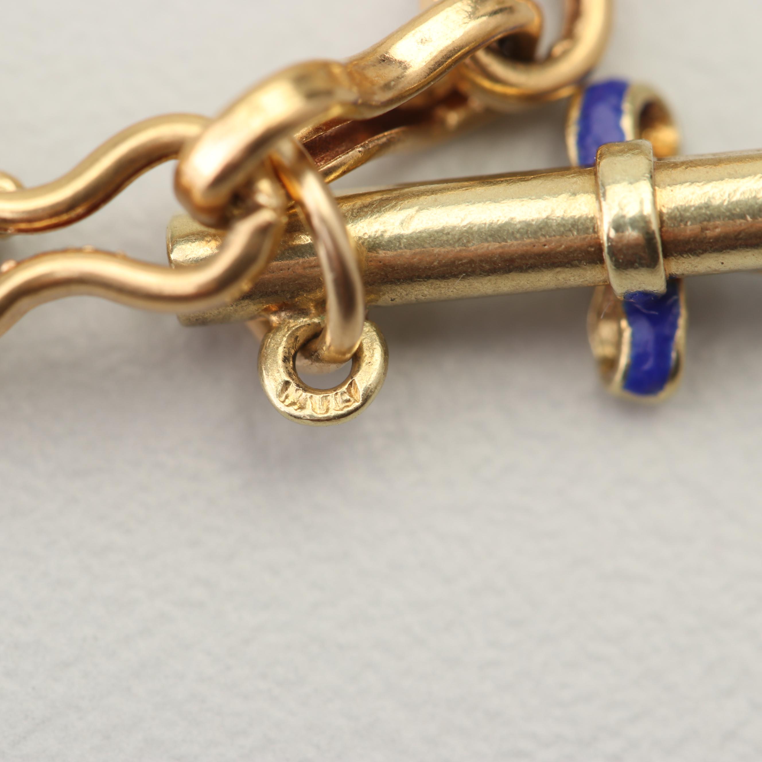 18K Yellow Gold Charm Bracelet with 14K and 10K Yellow Gold Charms